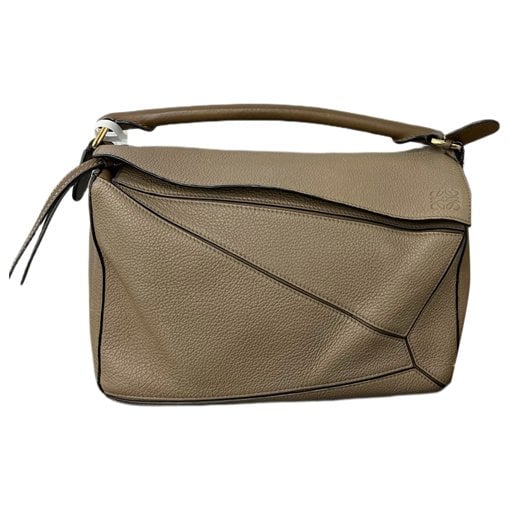 Puzzle leather handbag