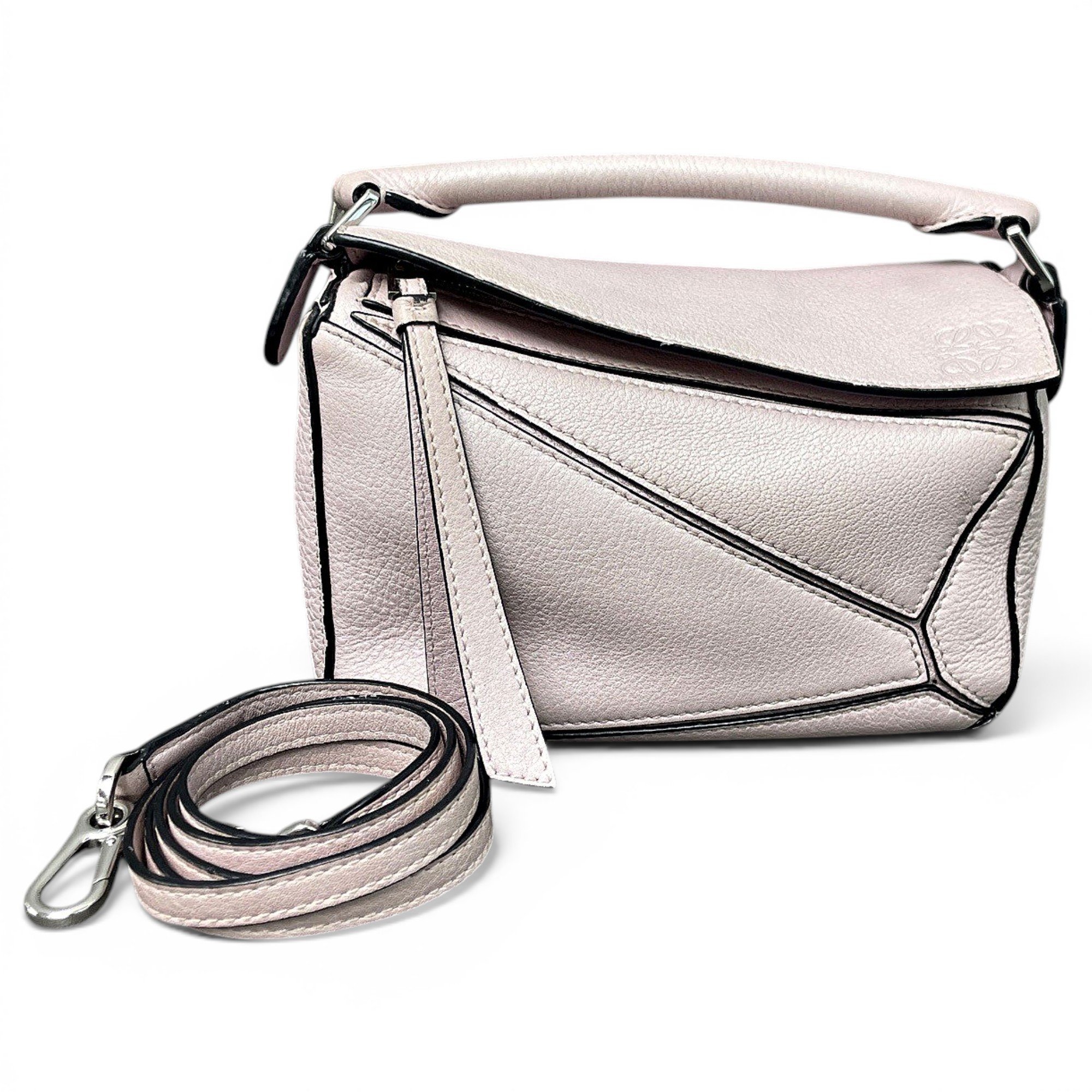 Puzzle leather handbag