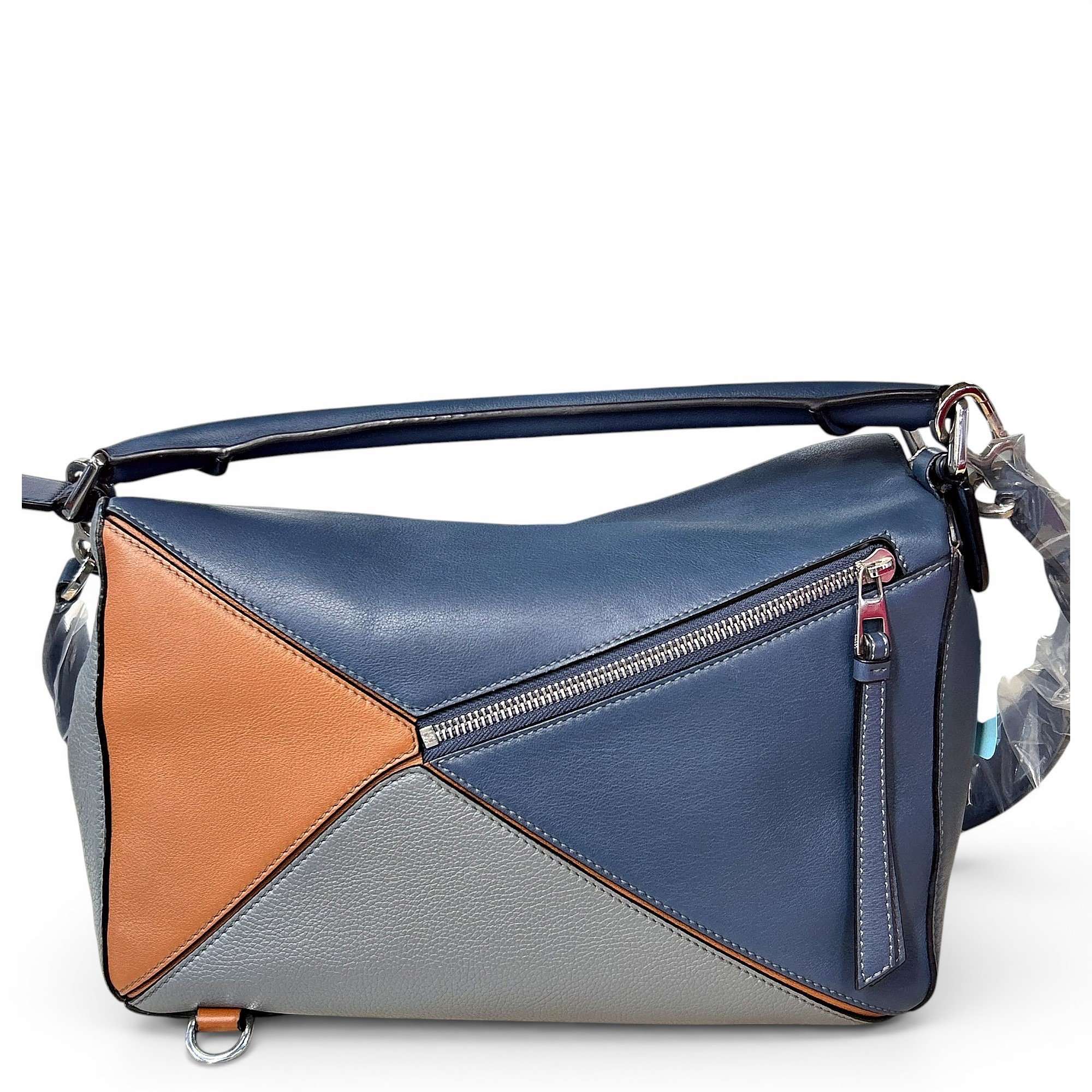 Puzzle leather handbag
