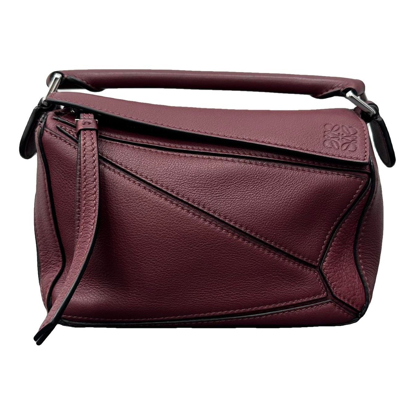 Puzzle leather handbag
