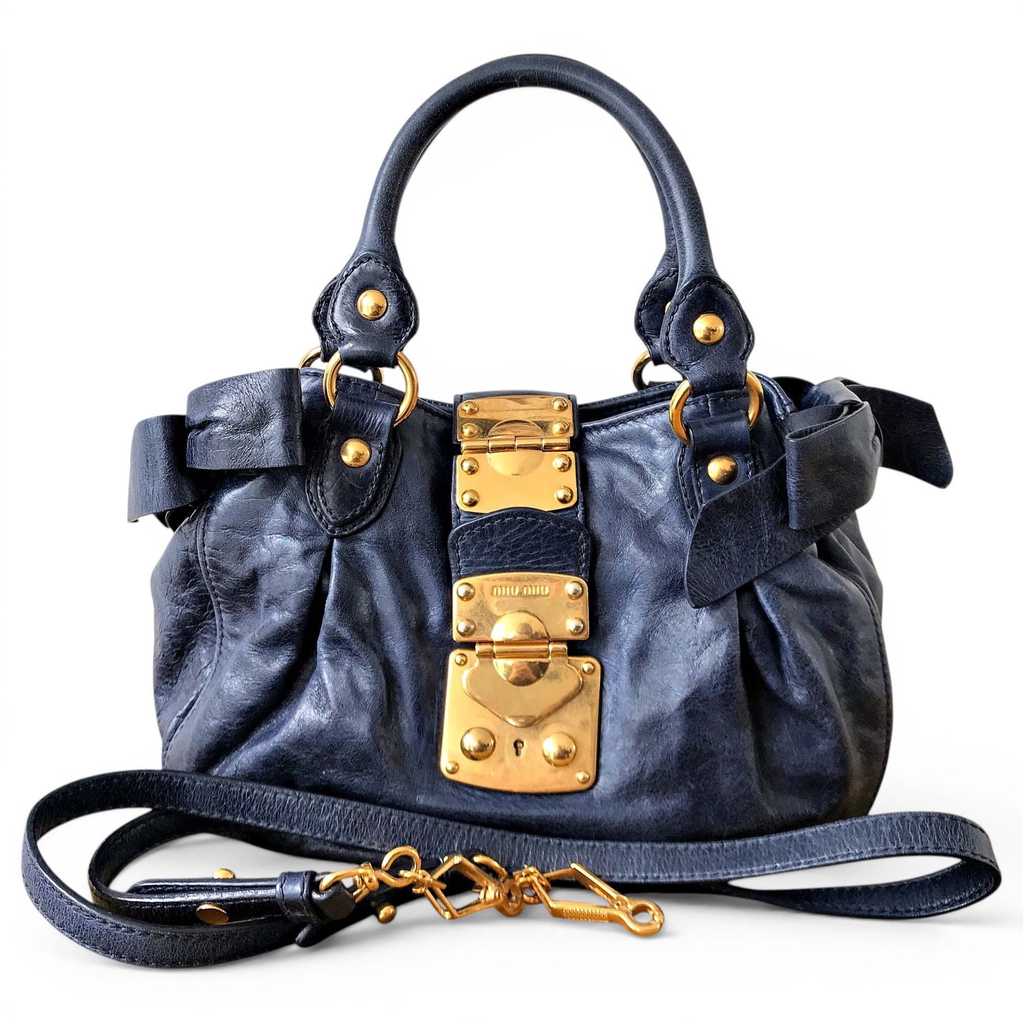 Bow bag leather handbag