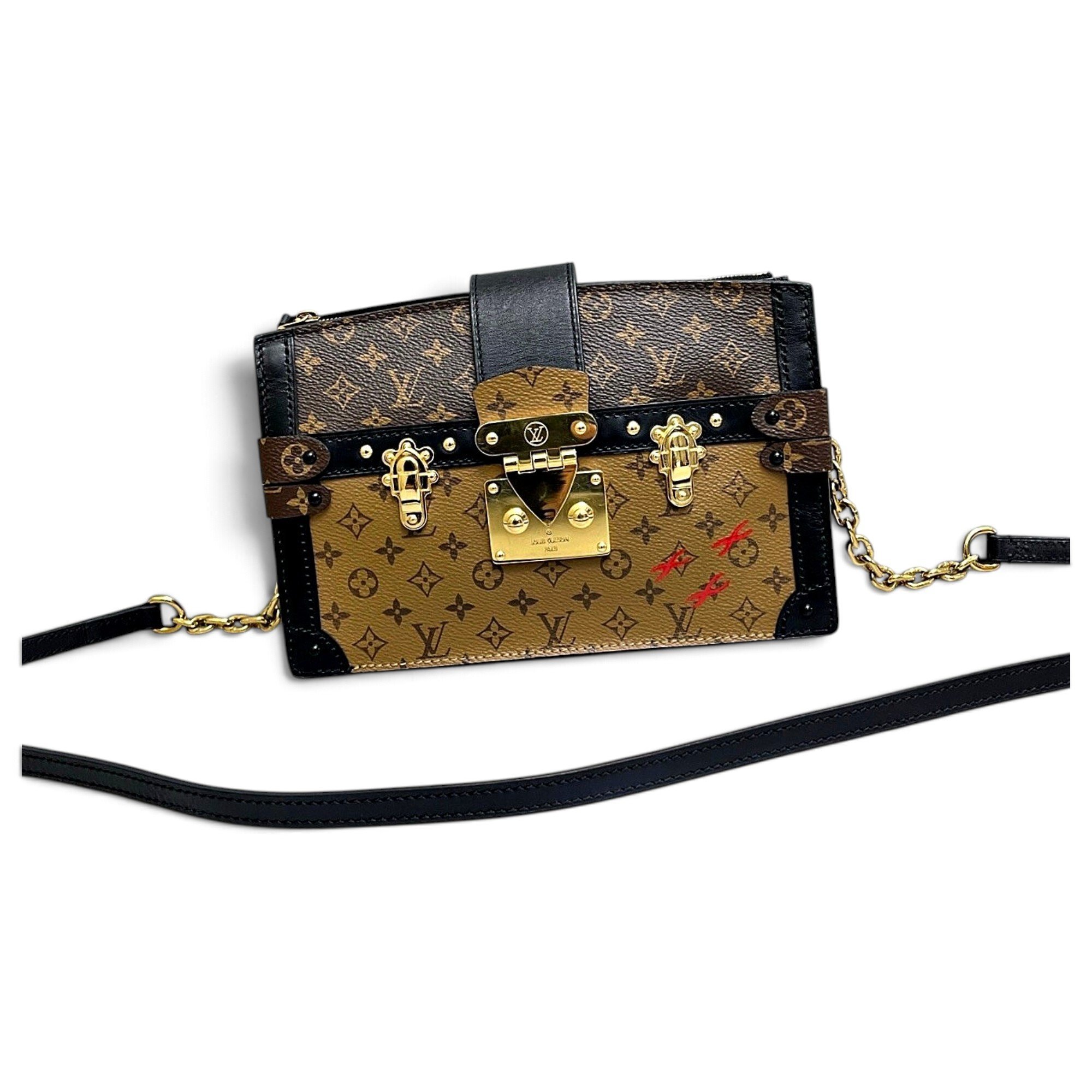Pochette Trunk leather handbag