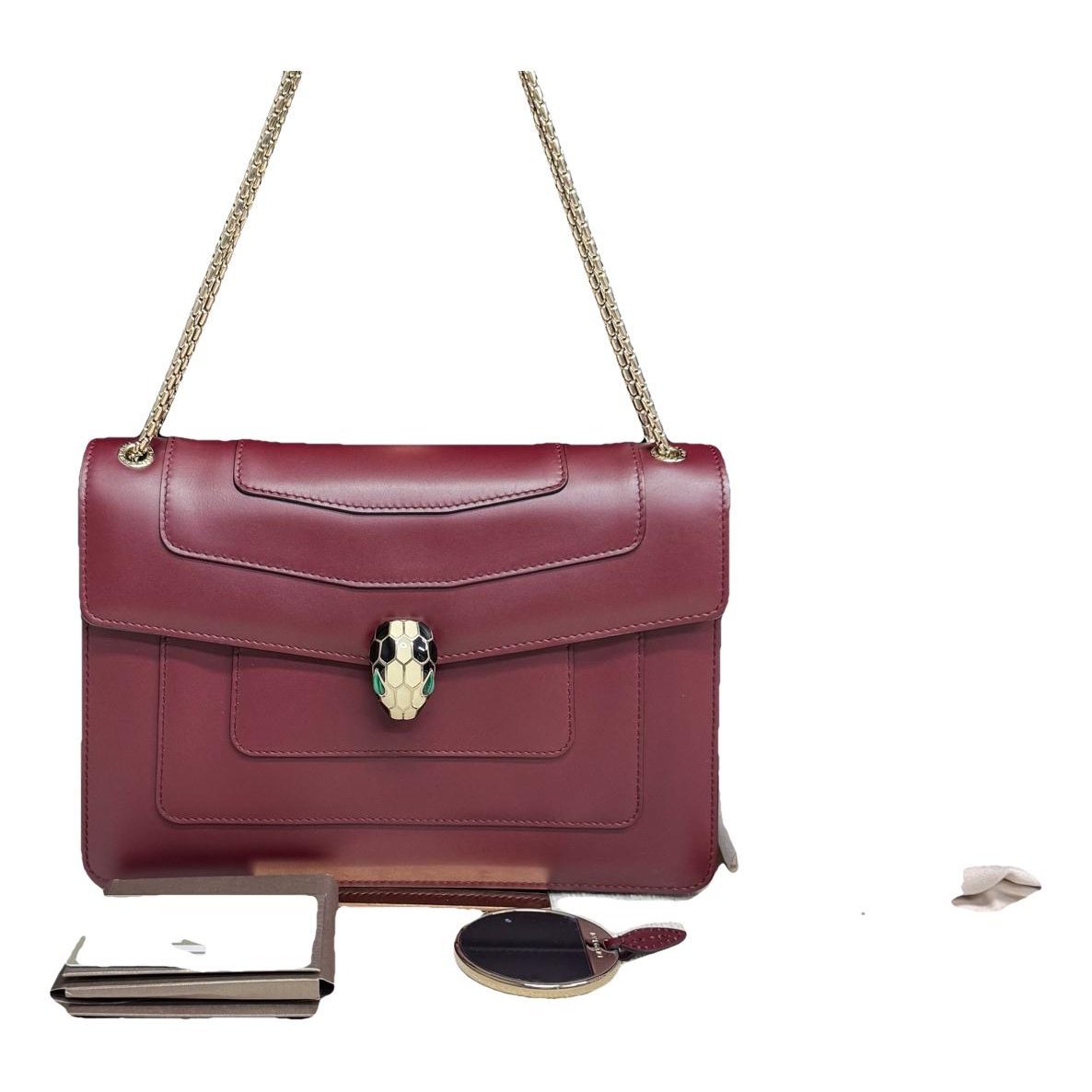 Serpenti leather handbag