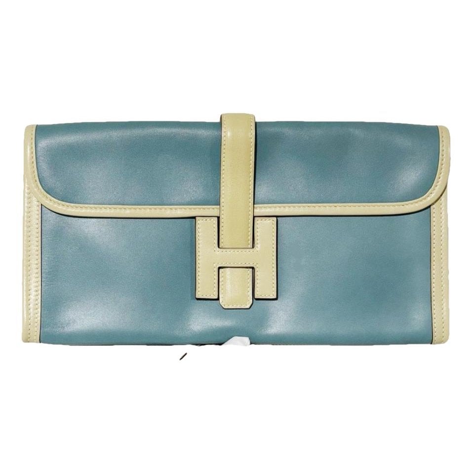Jige leather clutch bag