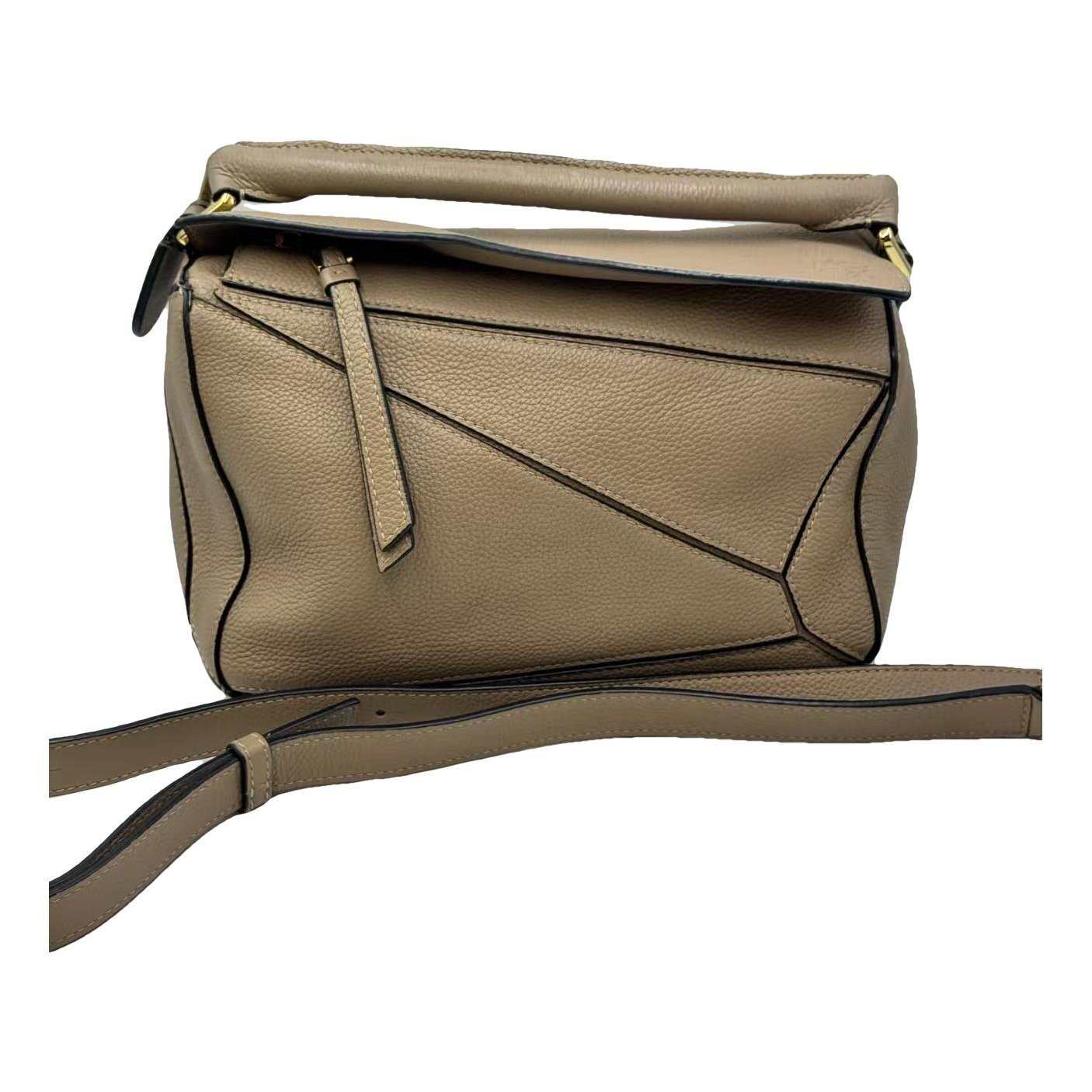 Puzzle leather handbag
