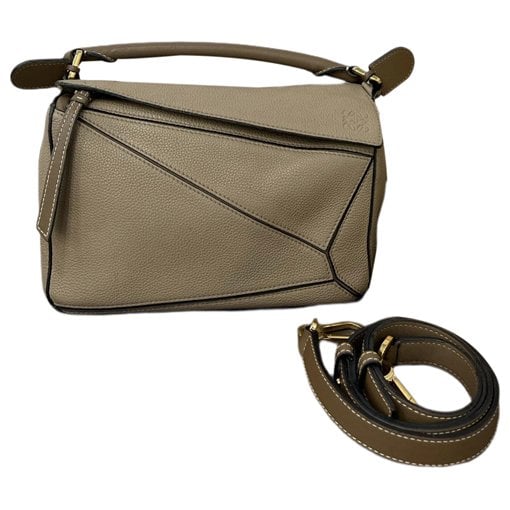 Puzzle leather handbag