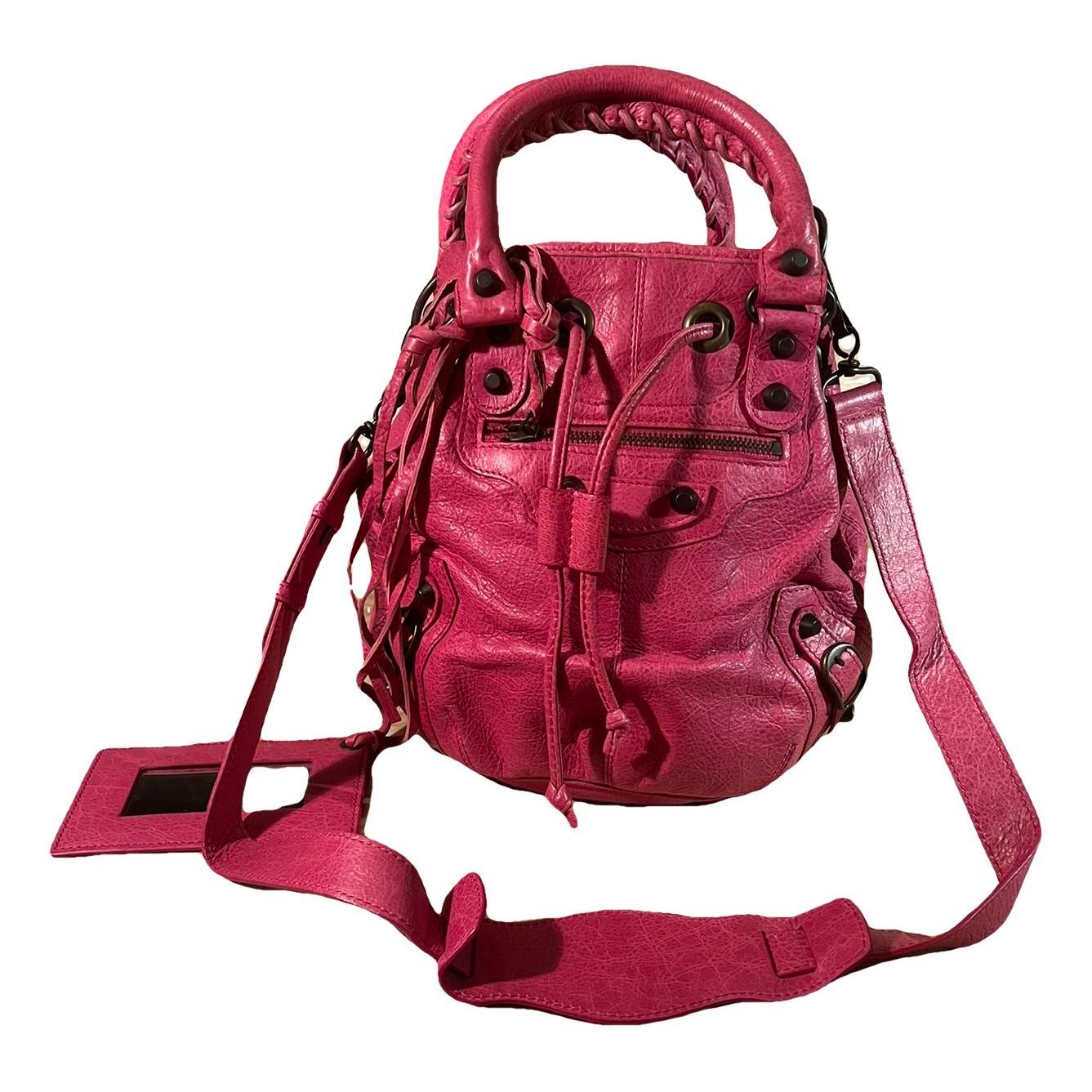 Pompon leather handbag