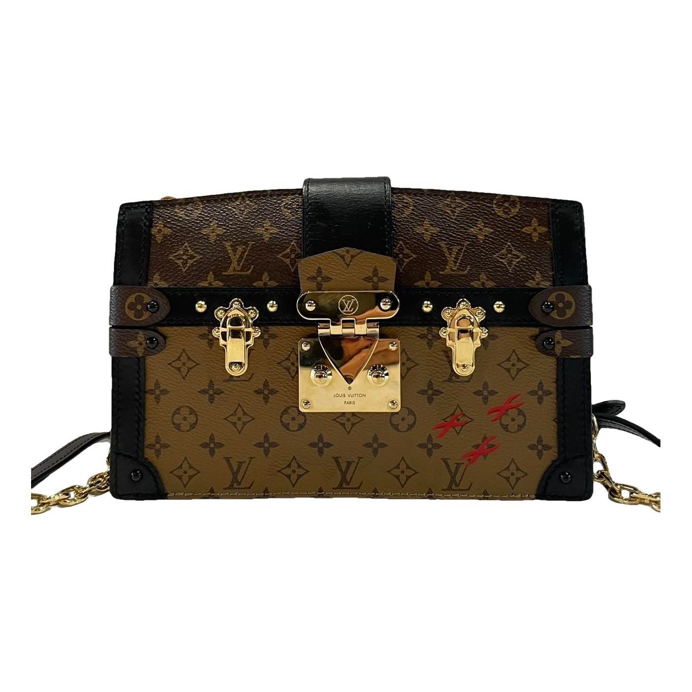 Pochette Trunk leather handbag