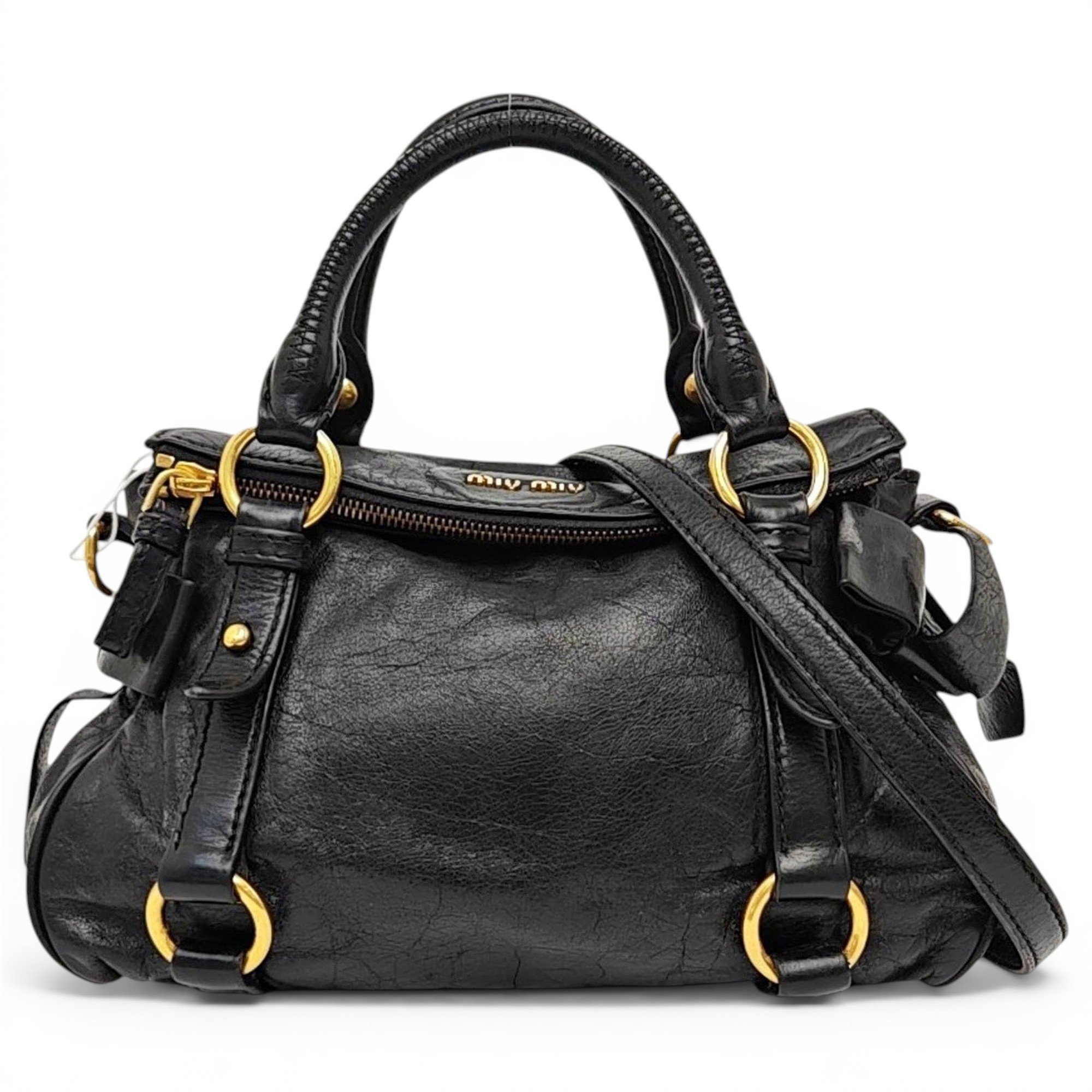Bow bag leather handbag