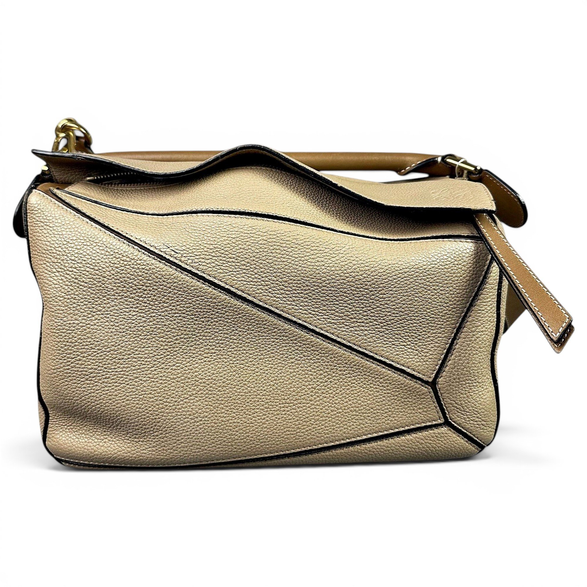 Puzzle leather handbag