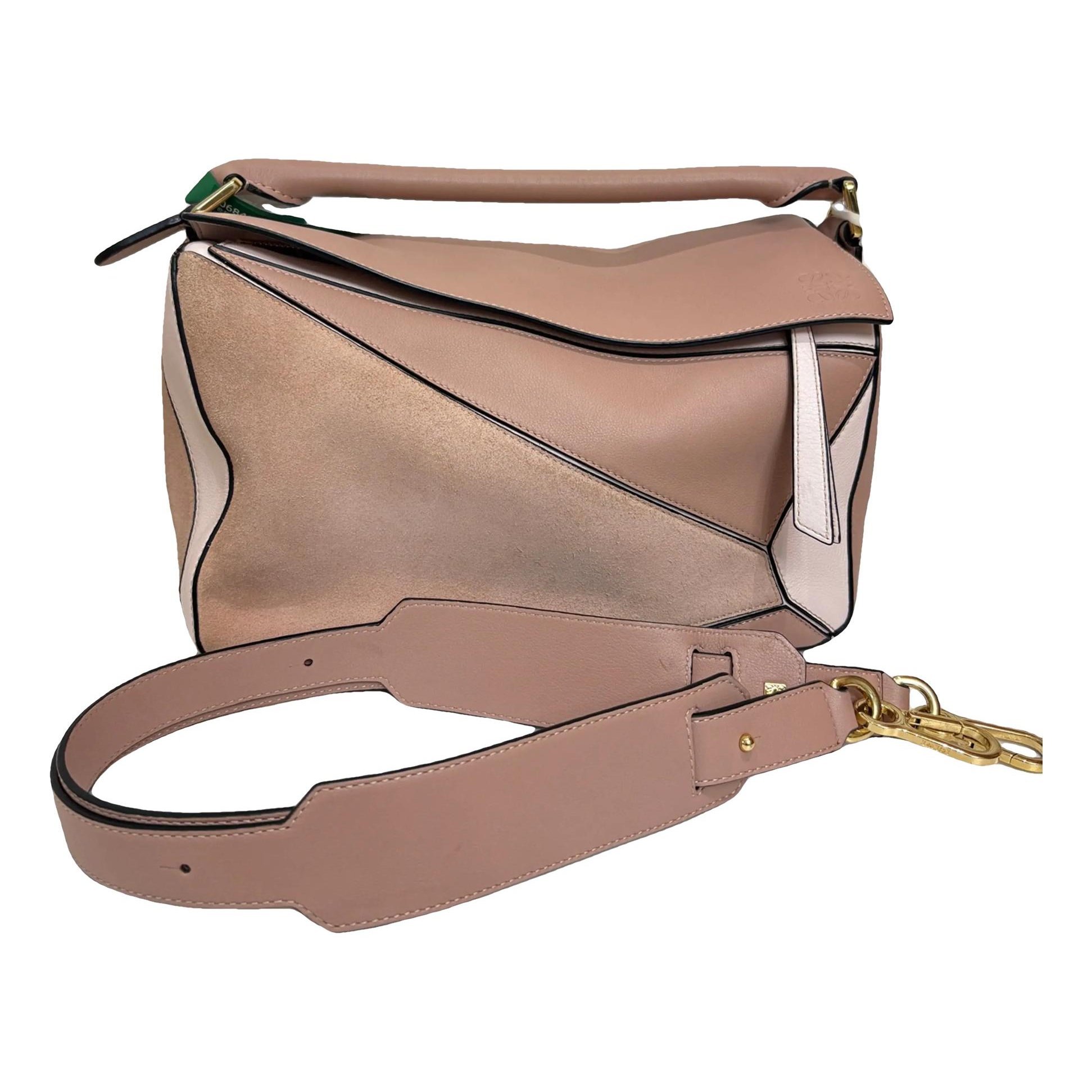 Puzzle leather handbag