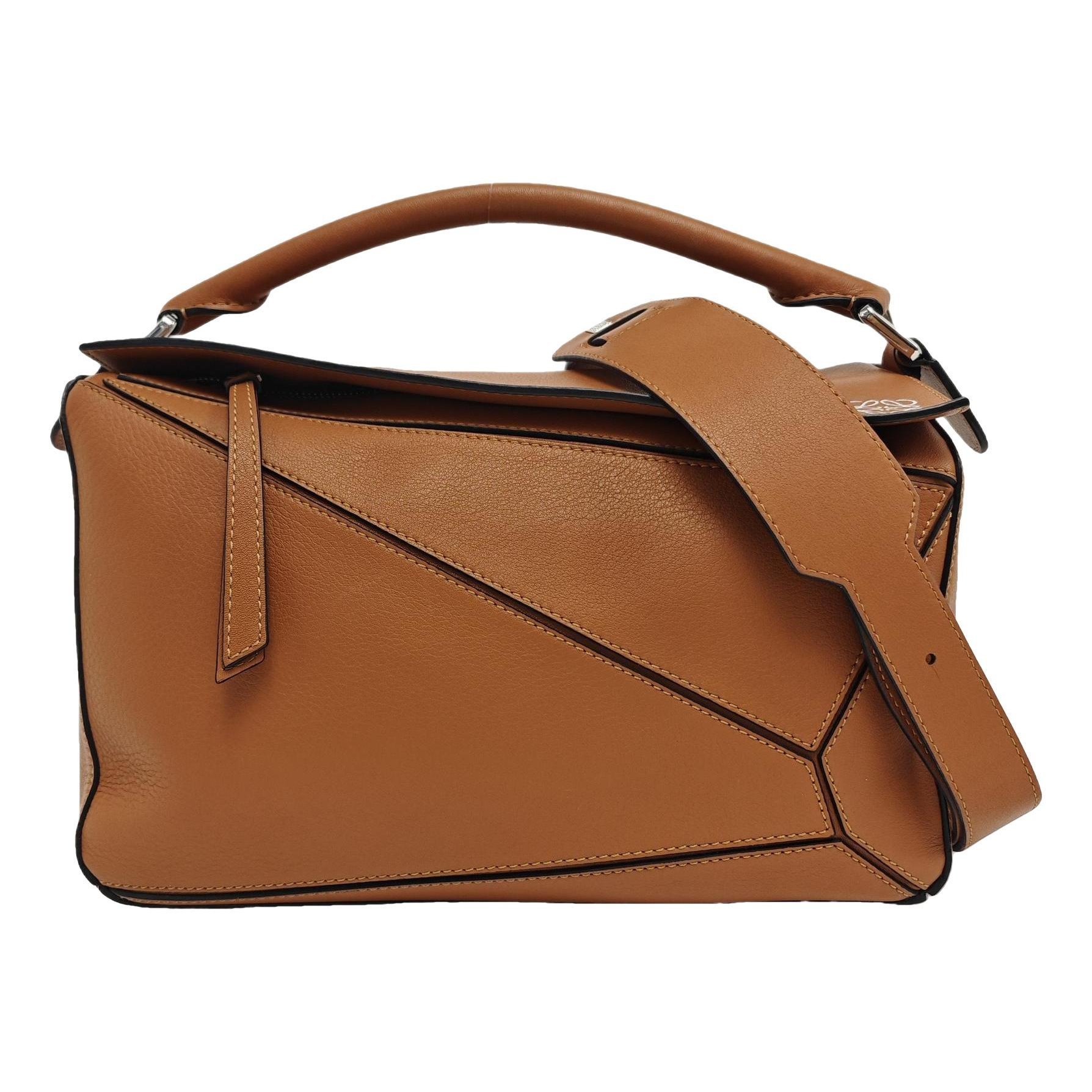 Puzzle leather crossbody bag