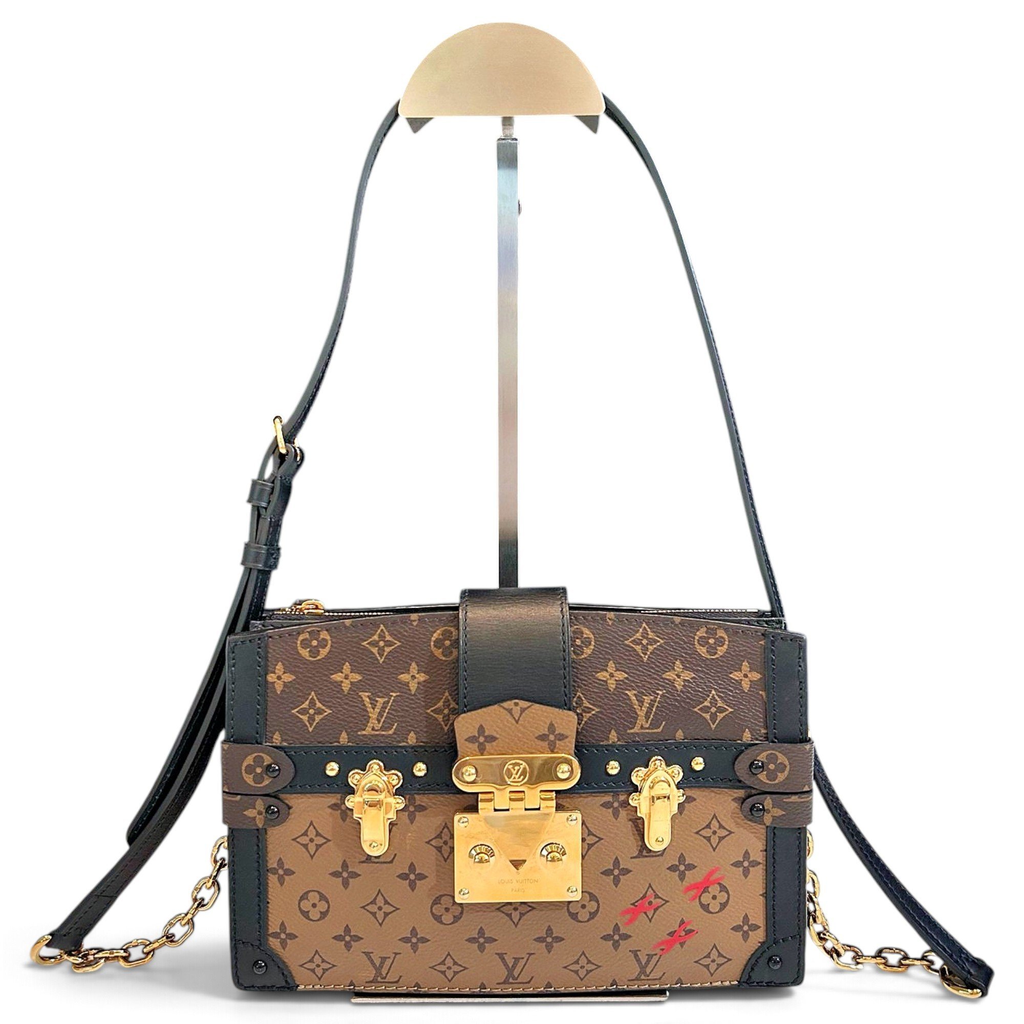 Pochette Trunk leather handbag