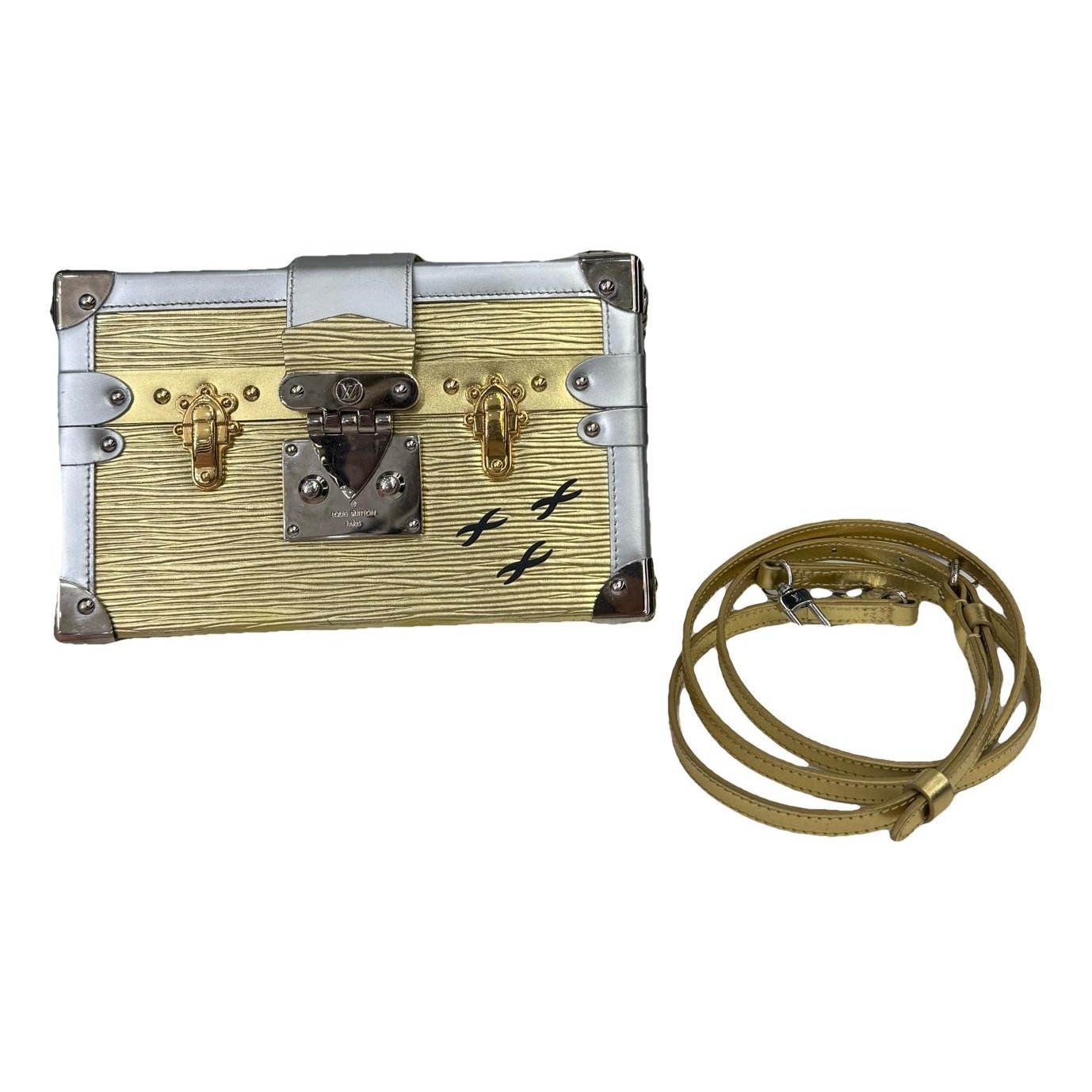 Pochette Trunk leather handbag