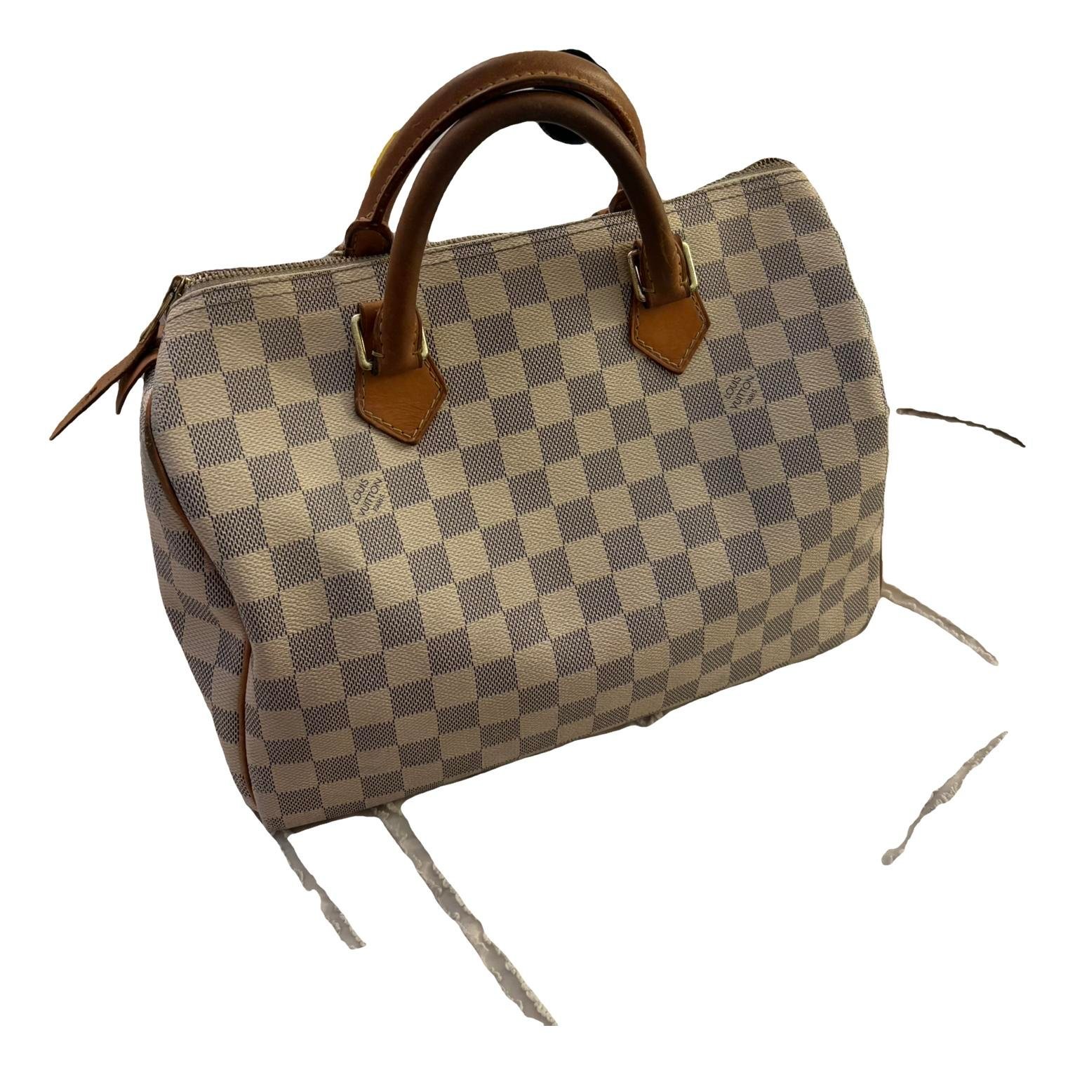 Speedy leather handbag