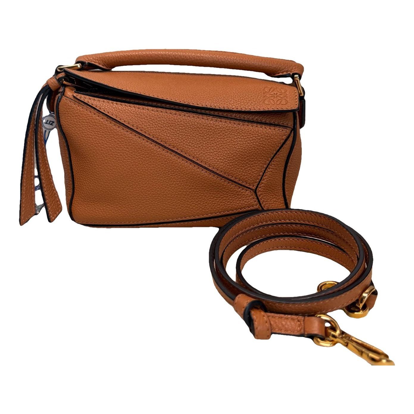 Puzzle leather handbag