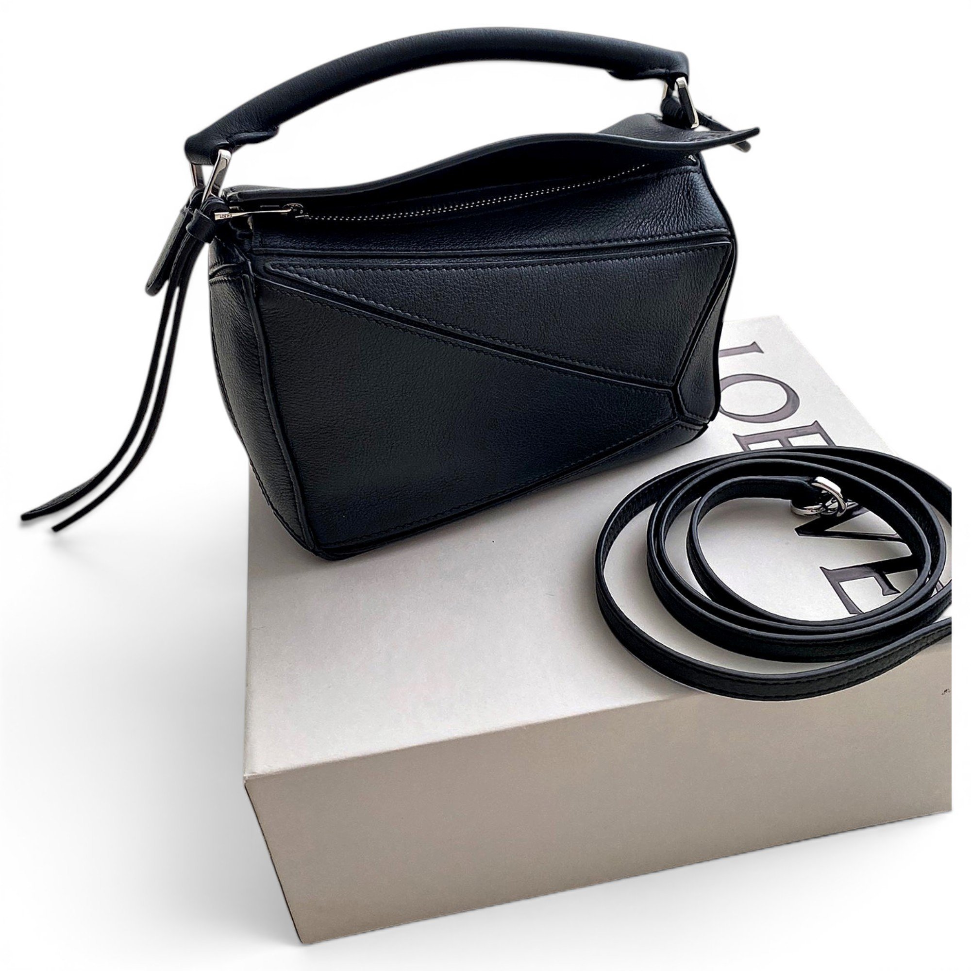 Puzzle leather handbag