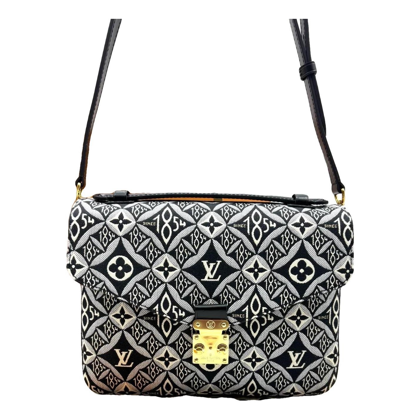 Maxi Multi Pochette Accessoires mini bag