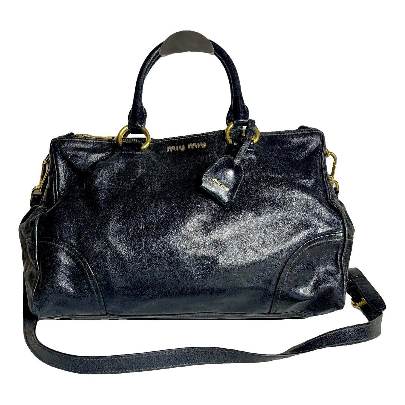 Bow bag leather handbag