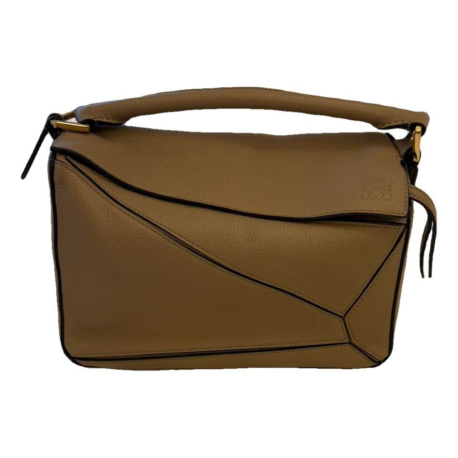 Puzzle leather handbag