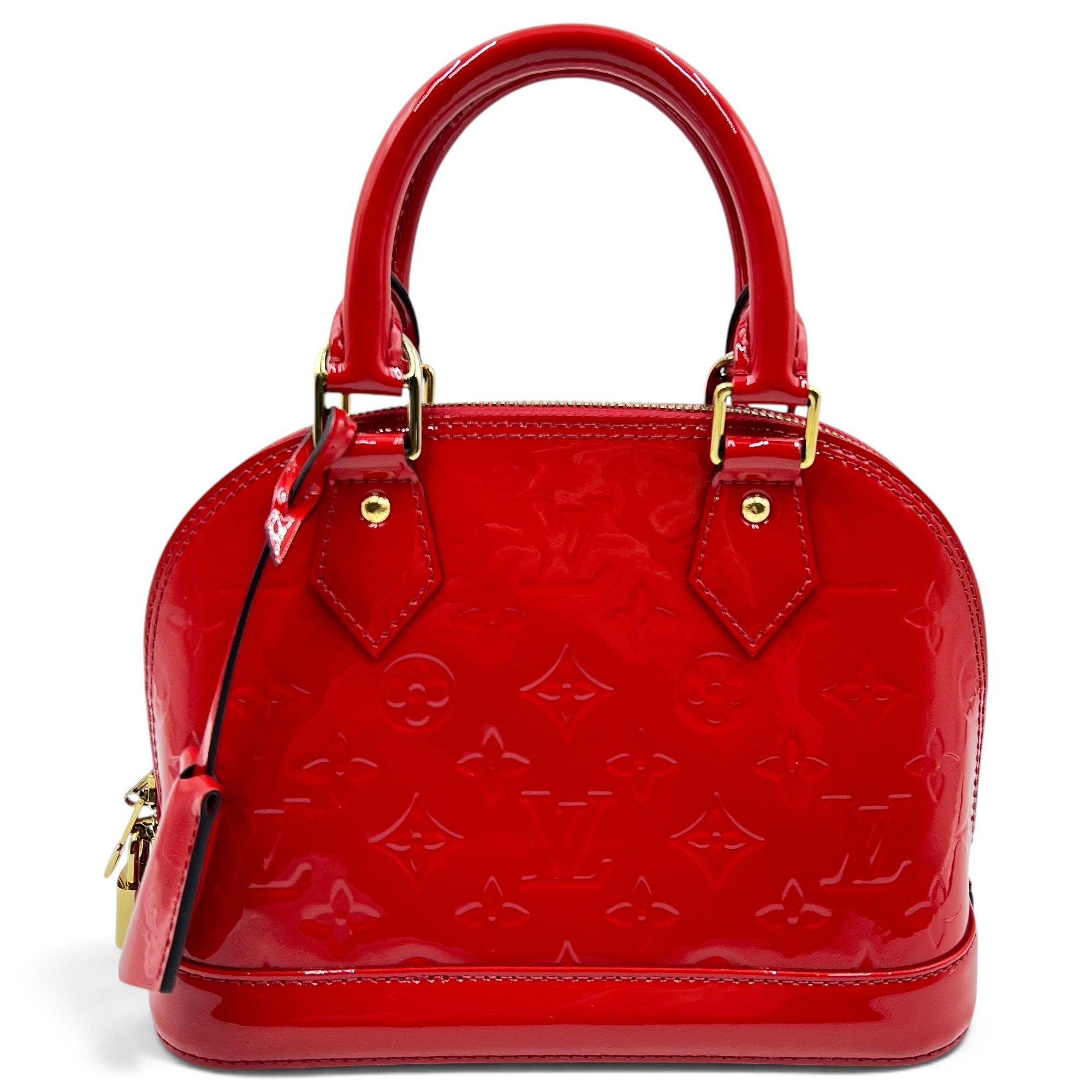 Louis Vuitton Alma patent leather handbag