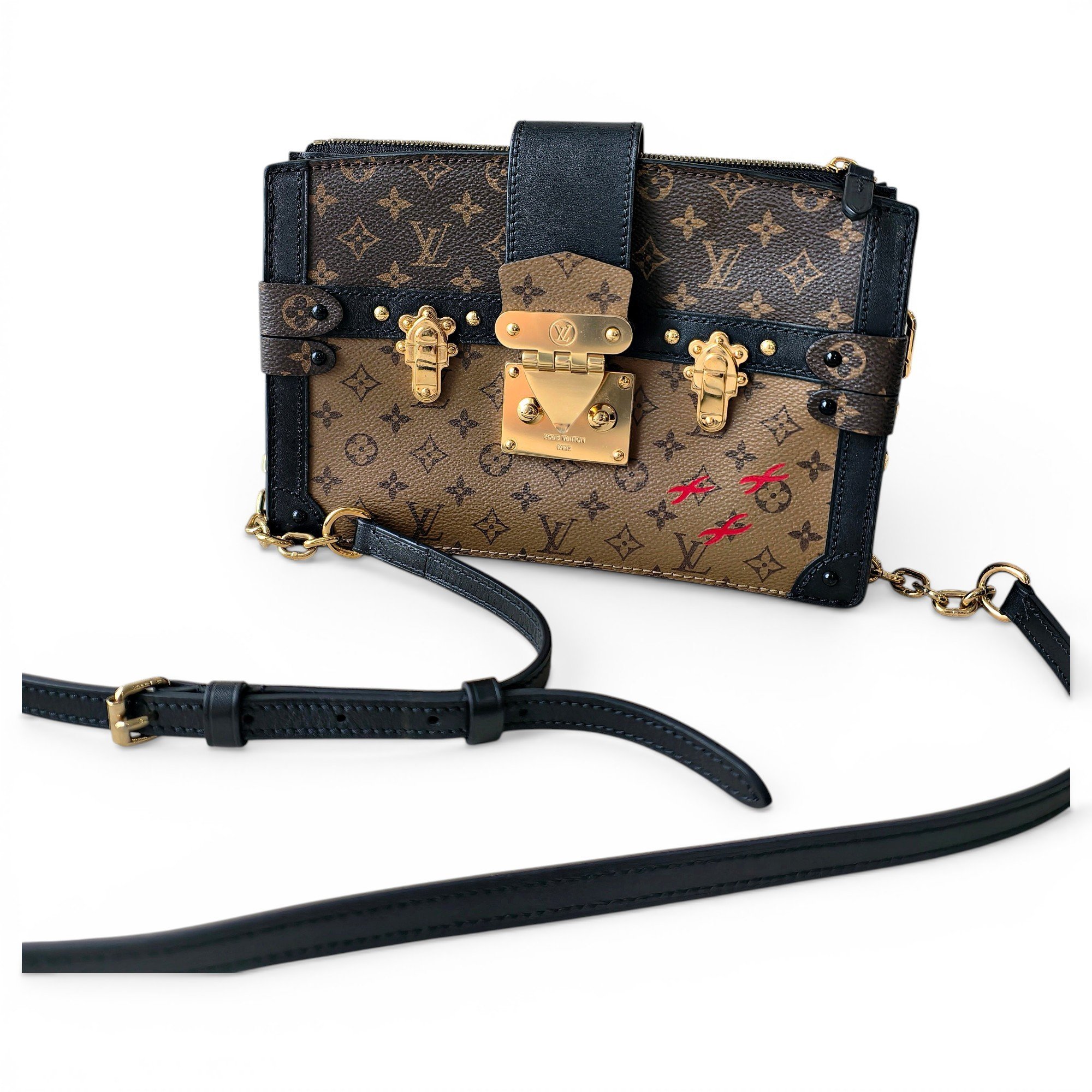 Pochette Trunk leather handbag