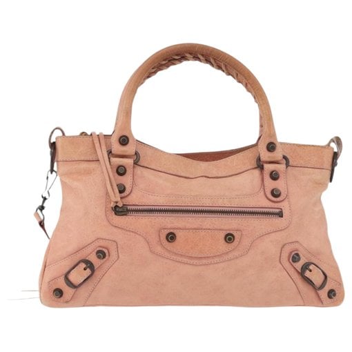 First leather handbag