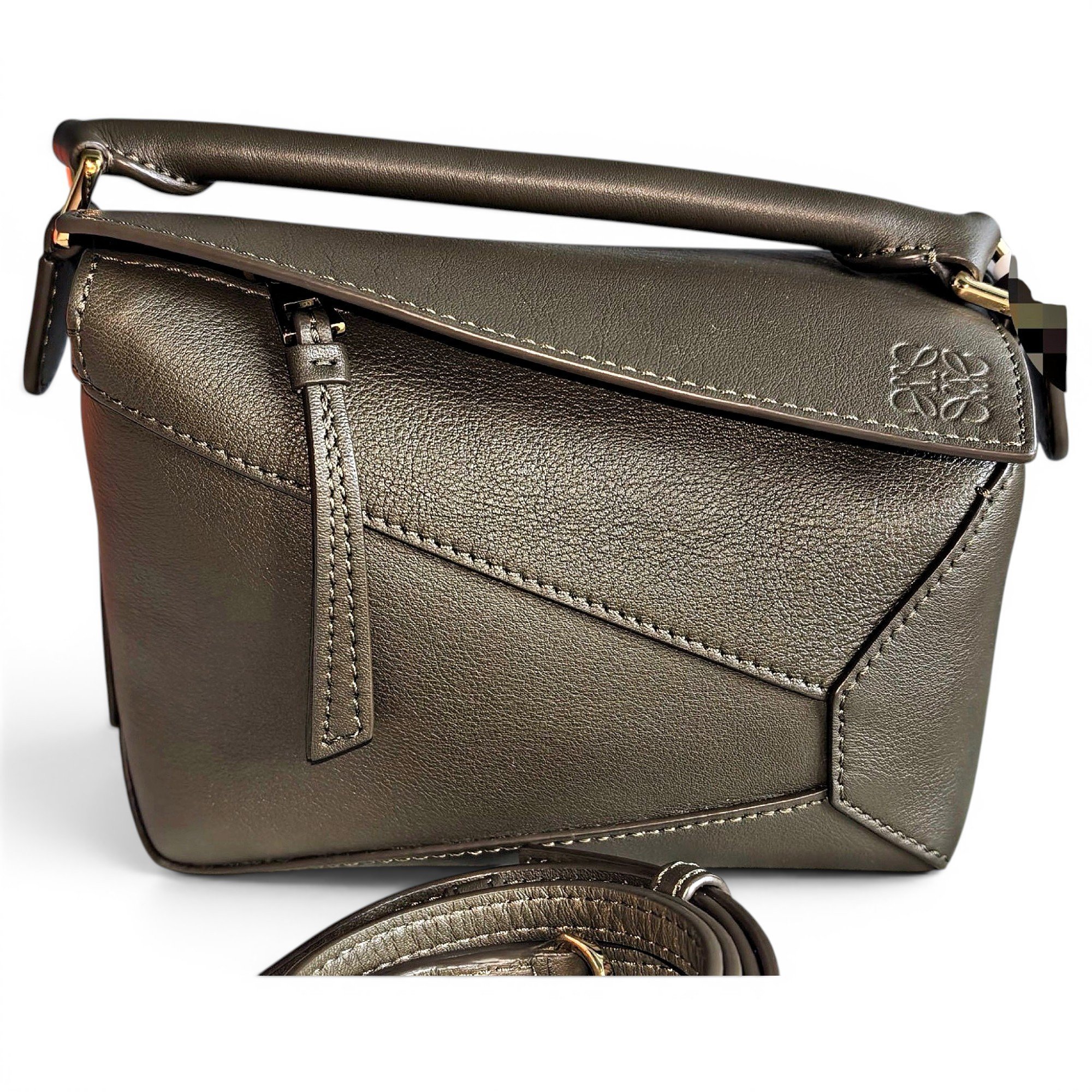 Puzzle leather handbag