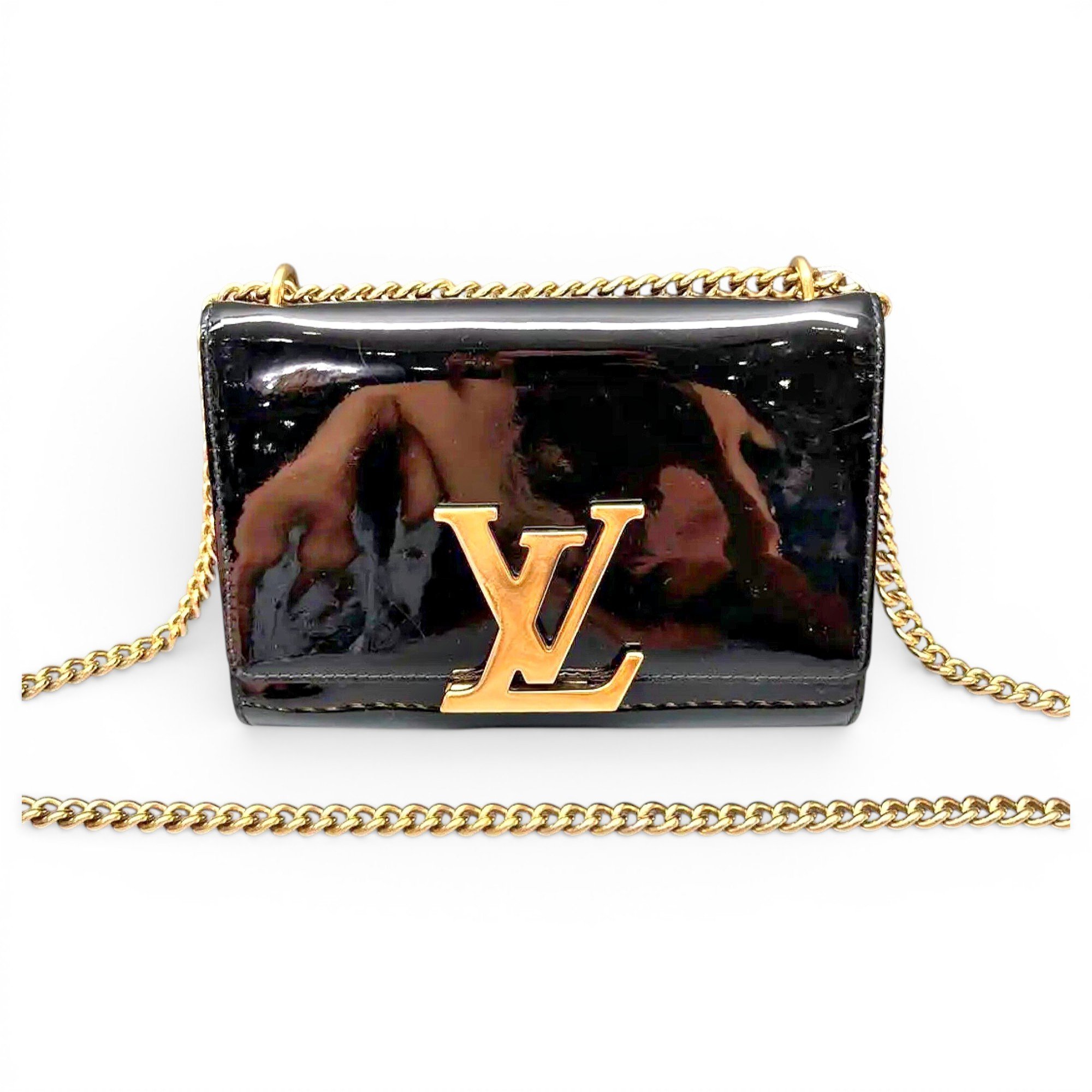 Twist patent leather handbag