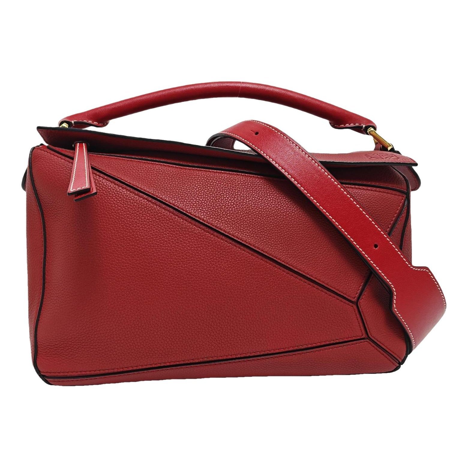 Puzzle leather handbag