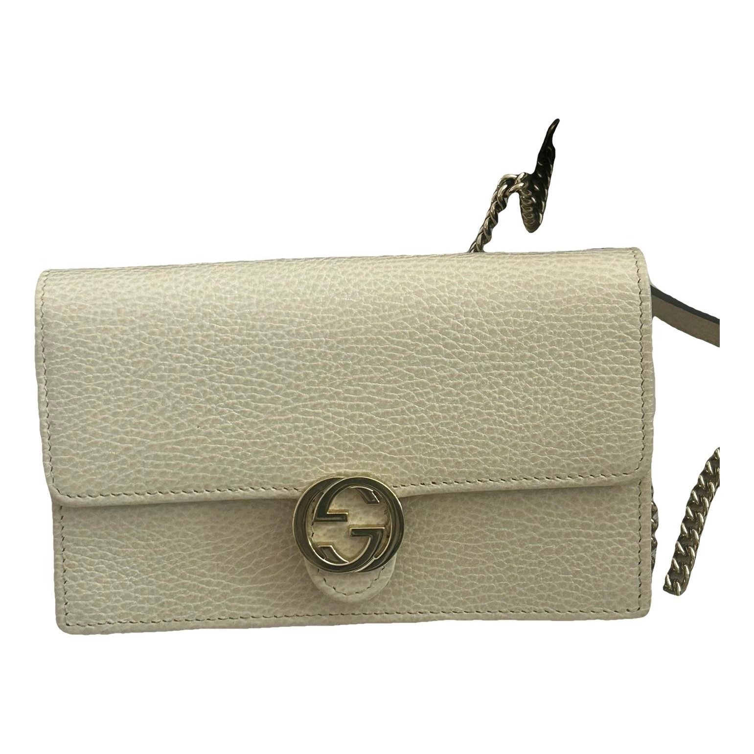 Interlocking leather clutch bag