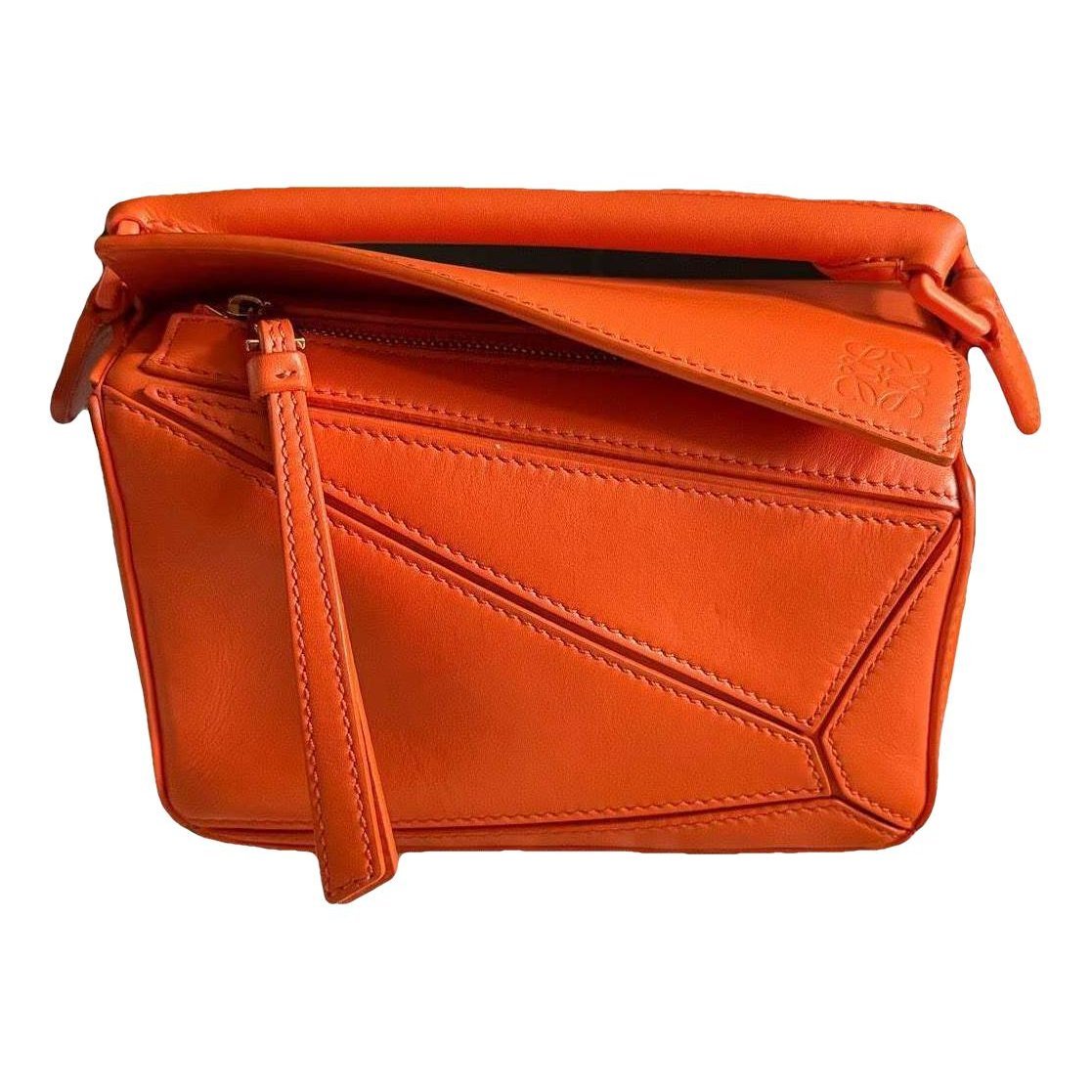 Puzzle leather handbag