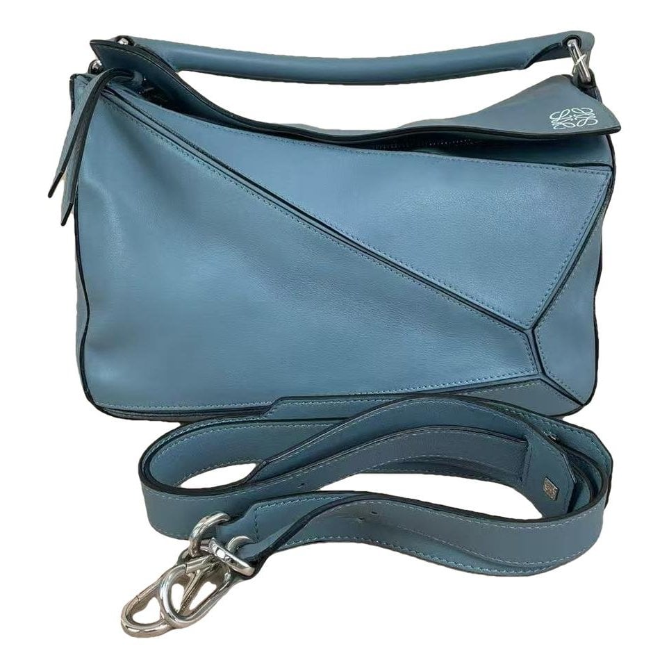 Puzzle leather handbag