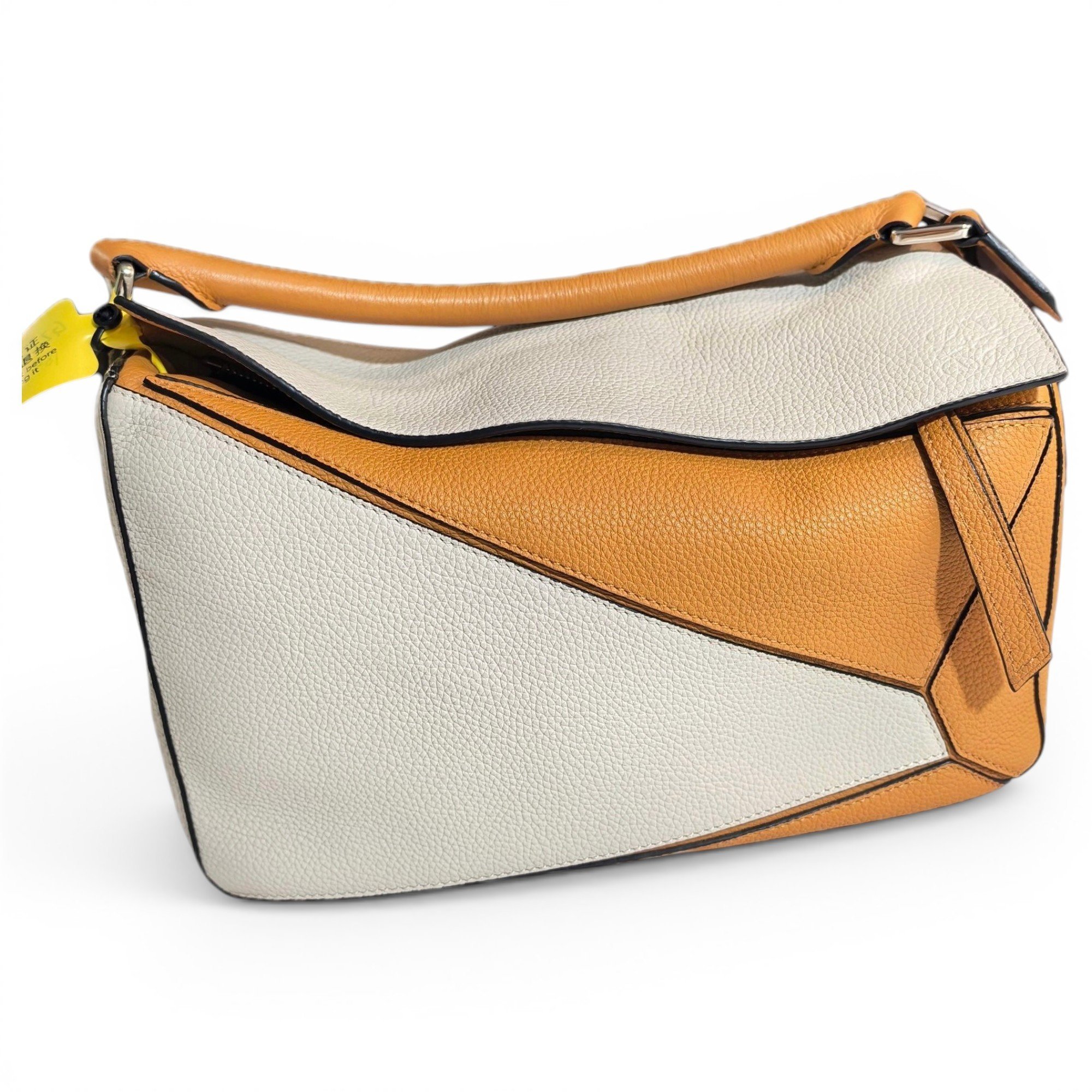 Puzzle leather handbag