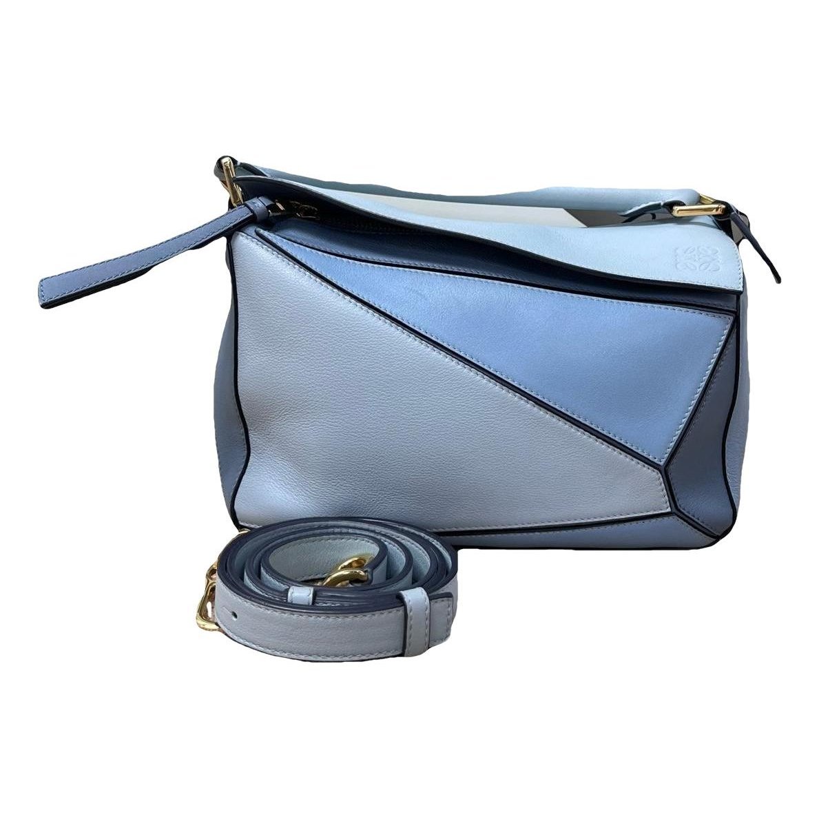 Puzzle leather handbag