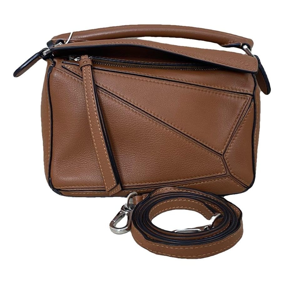 Puzzle leather handbag