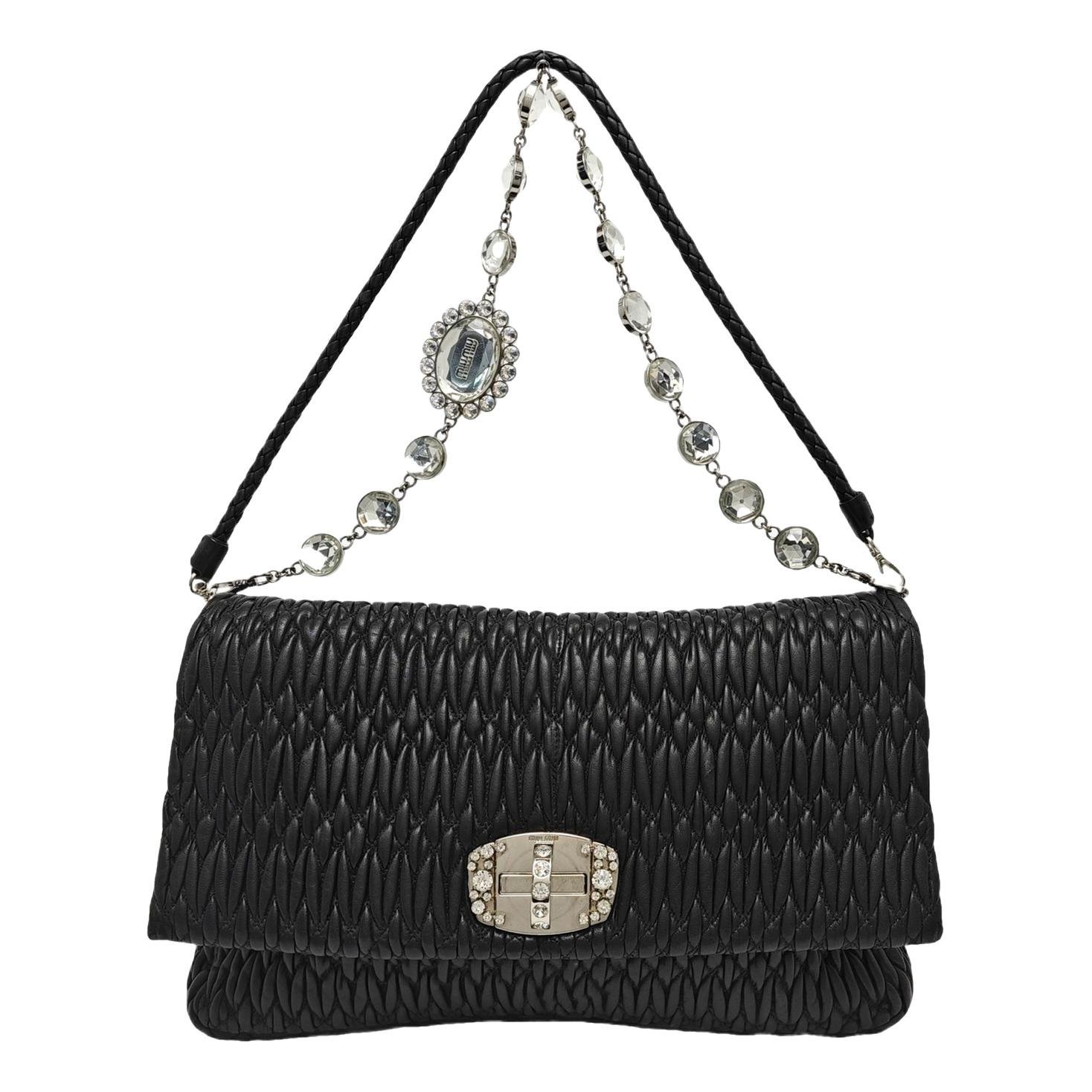 Miu Crystal leather handbag