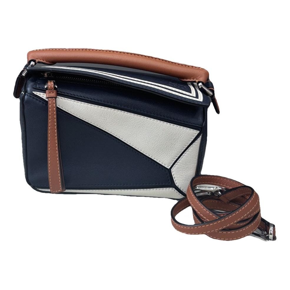 Puzzle leather handbag