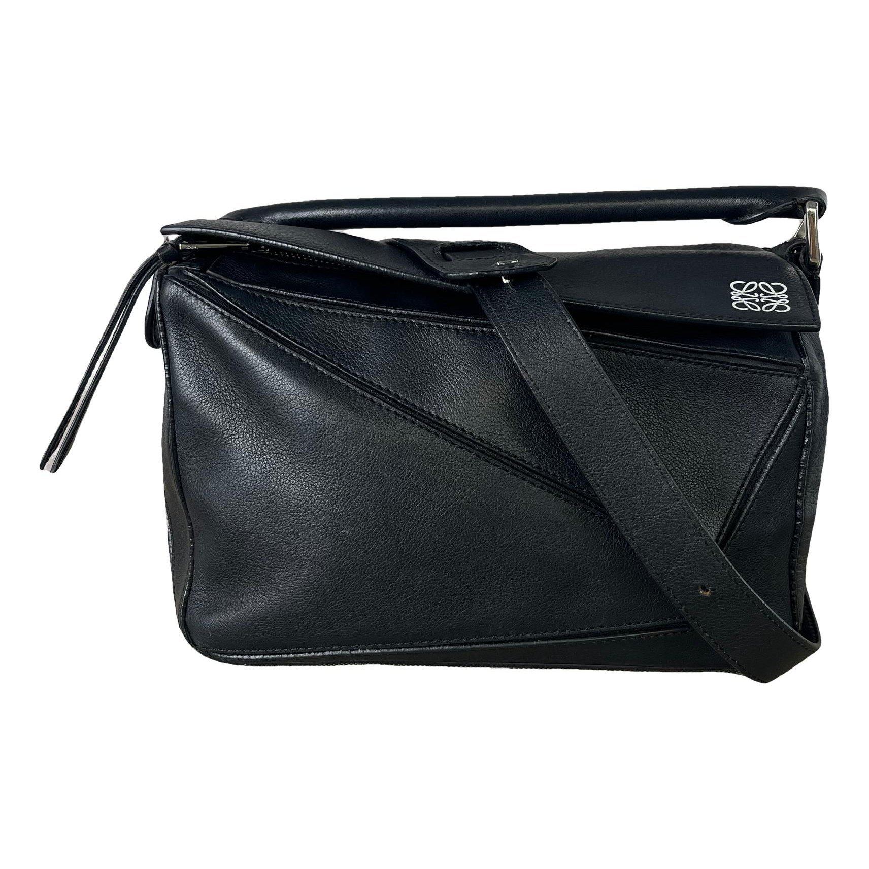 Puzzle leather handbag