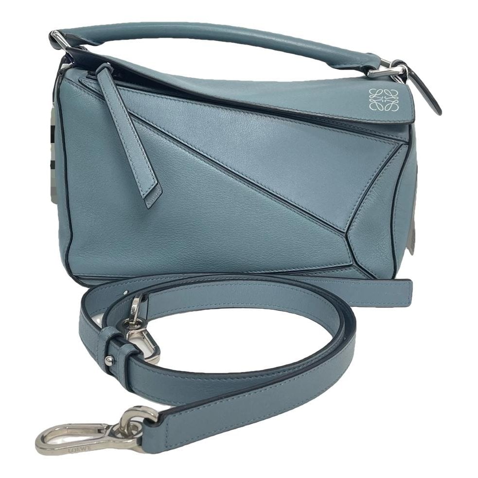 Puzzle leather handbag
