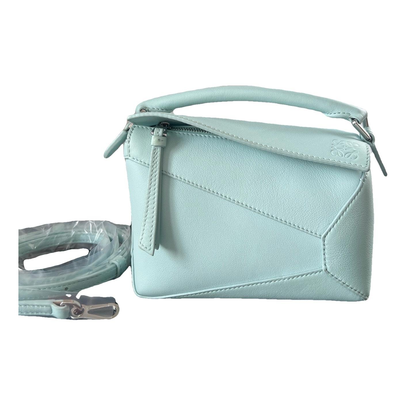 Puzzle leather handbag
