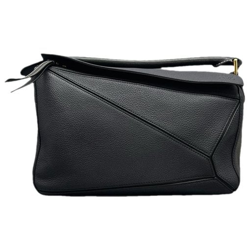 Puzzle leather handbag