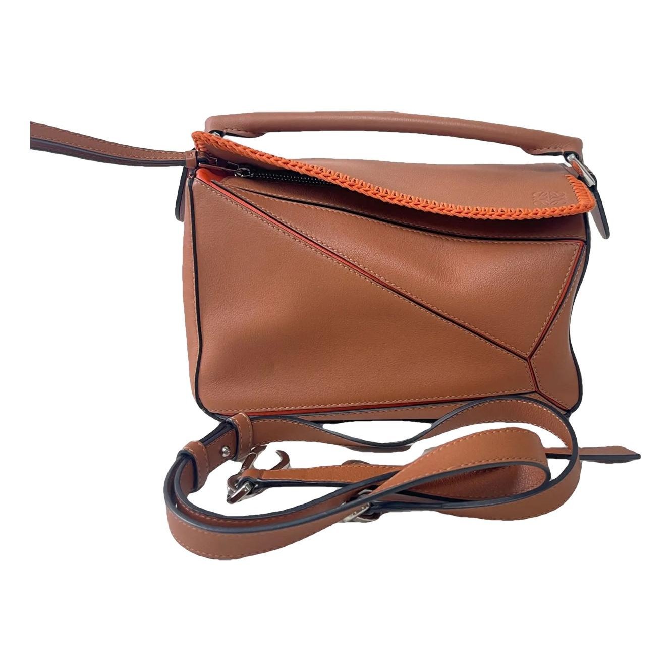 Puzzle leather crossbody bag