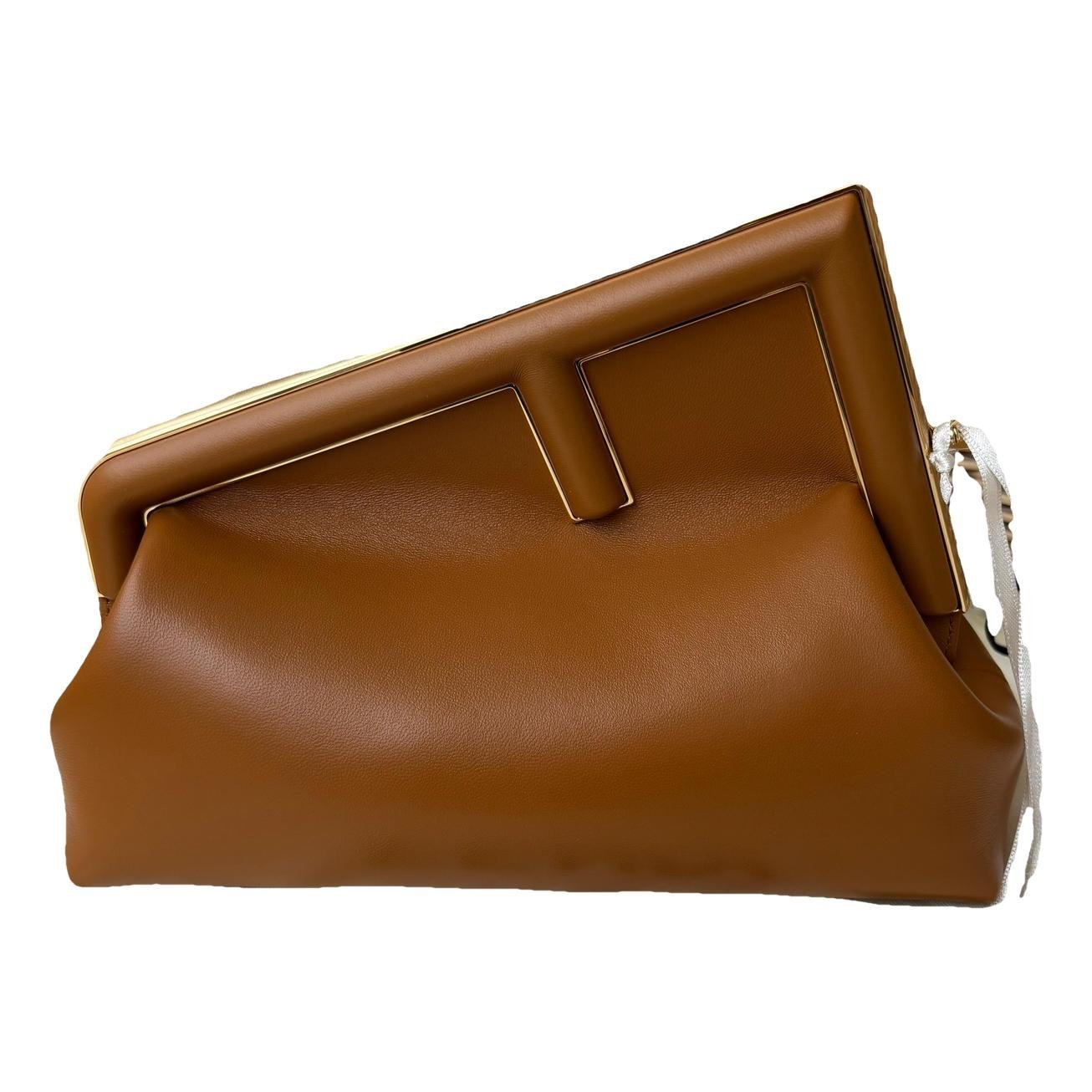 First leather handbag