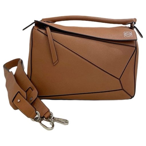 Puzzle leather handbag