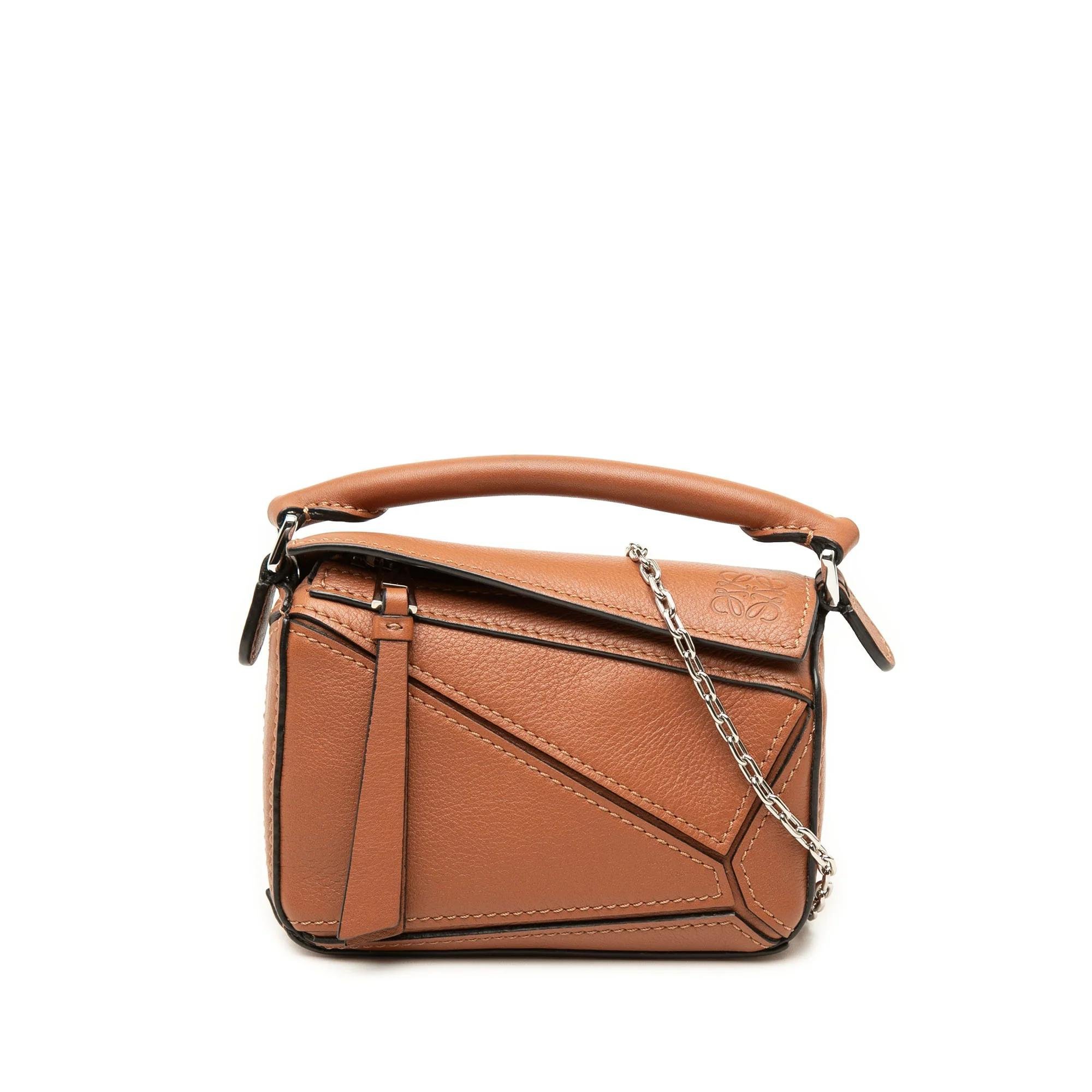 Puzzle leather handbag