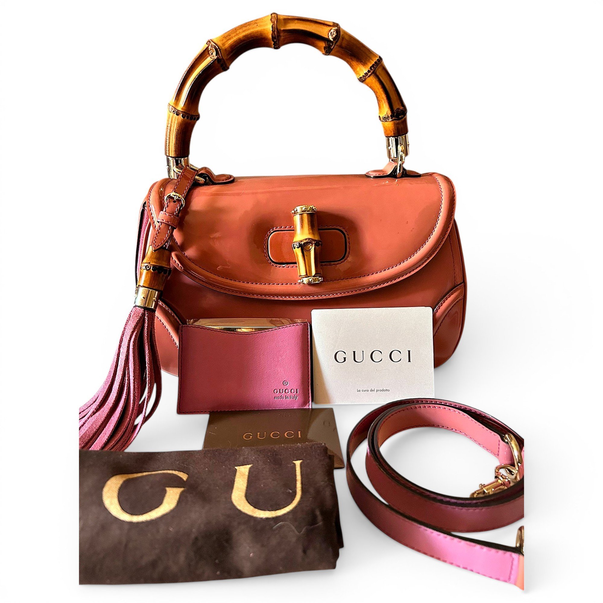 Convertible Pompon Bamboo Top Handle patent leather handbag