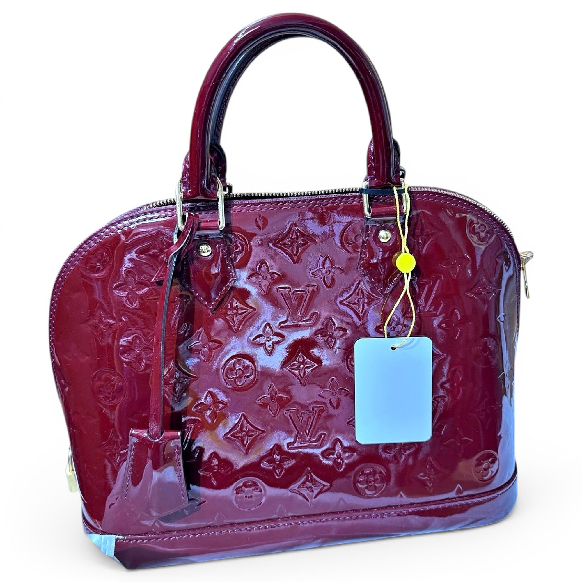 Alma patent leather handbag