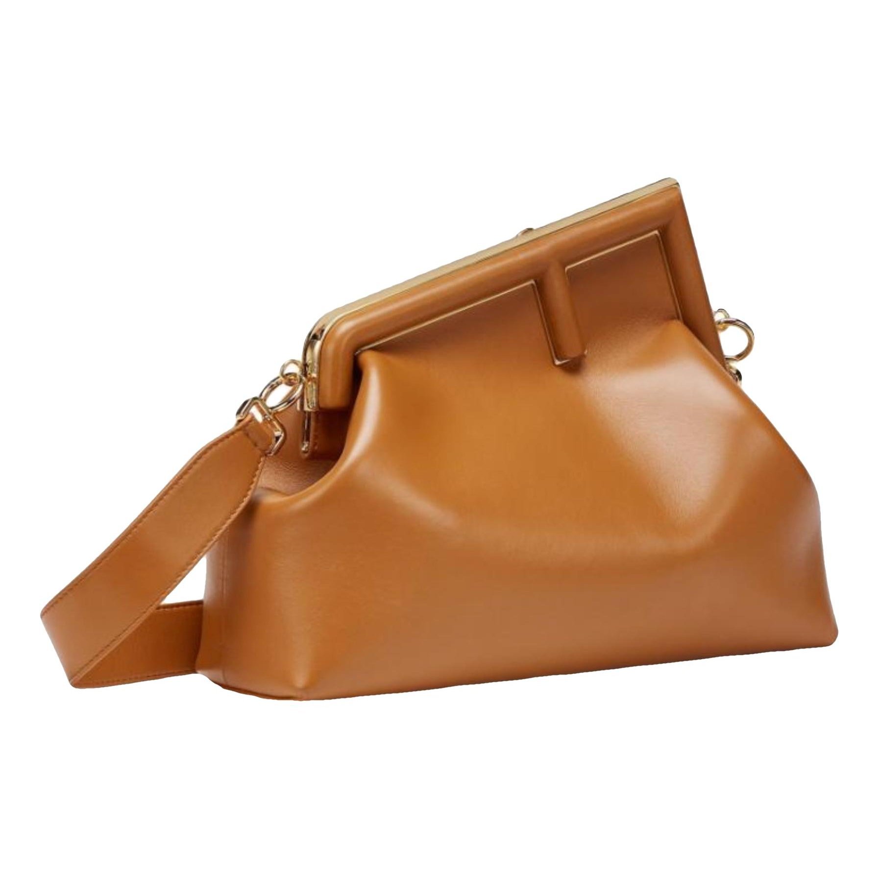 First leather handbag