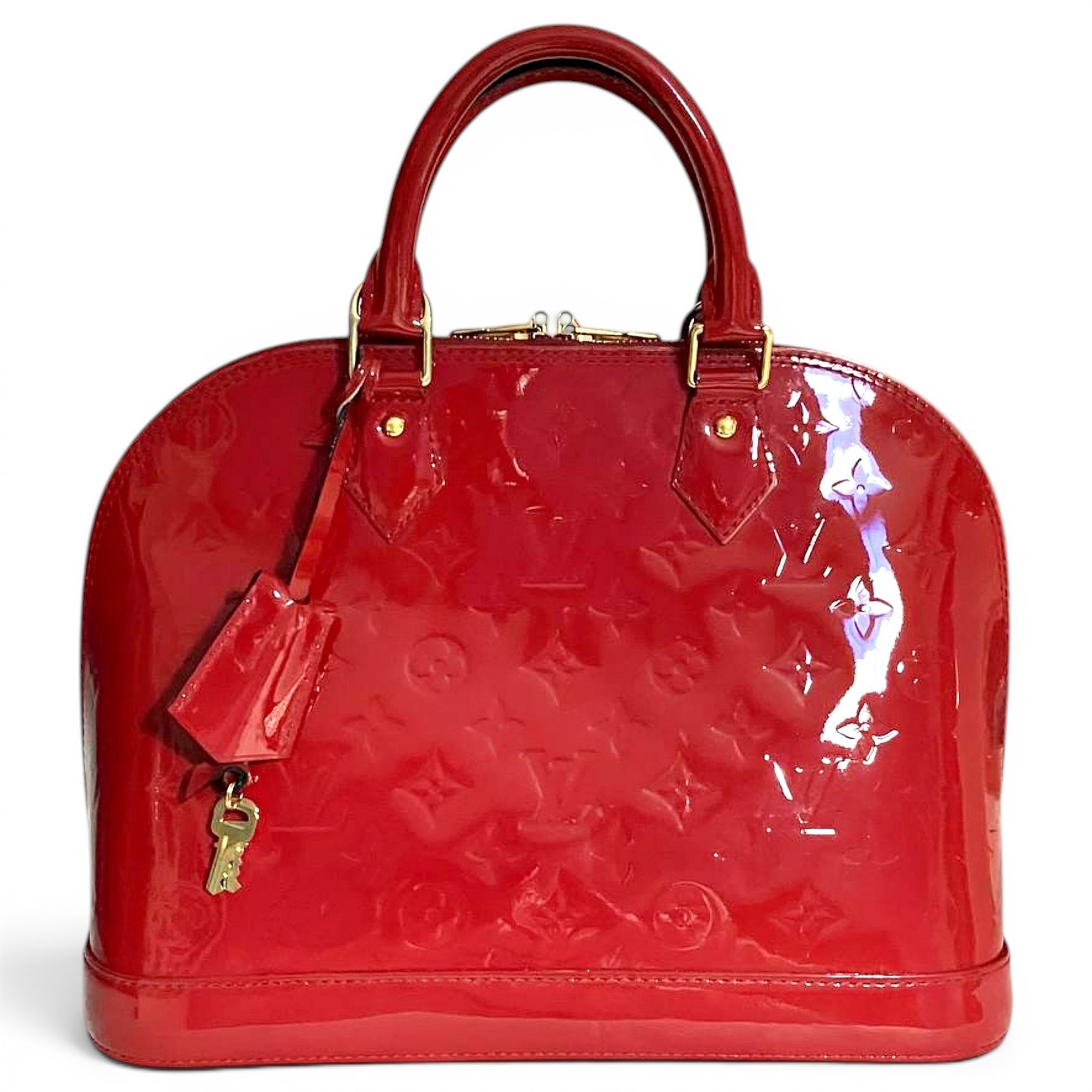 Louis Vuitton Alma patent leather handbag